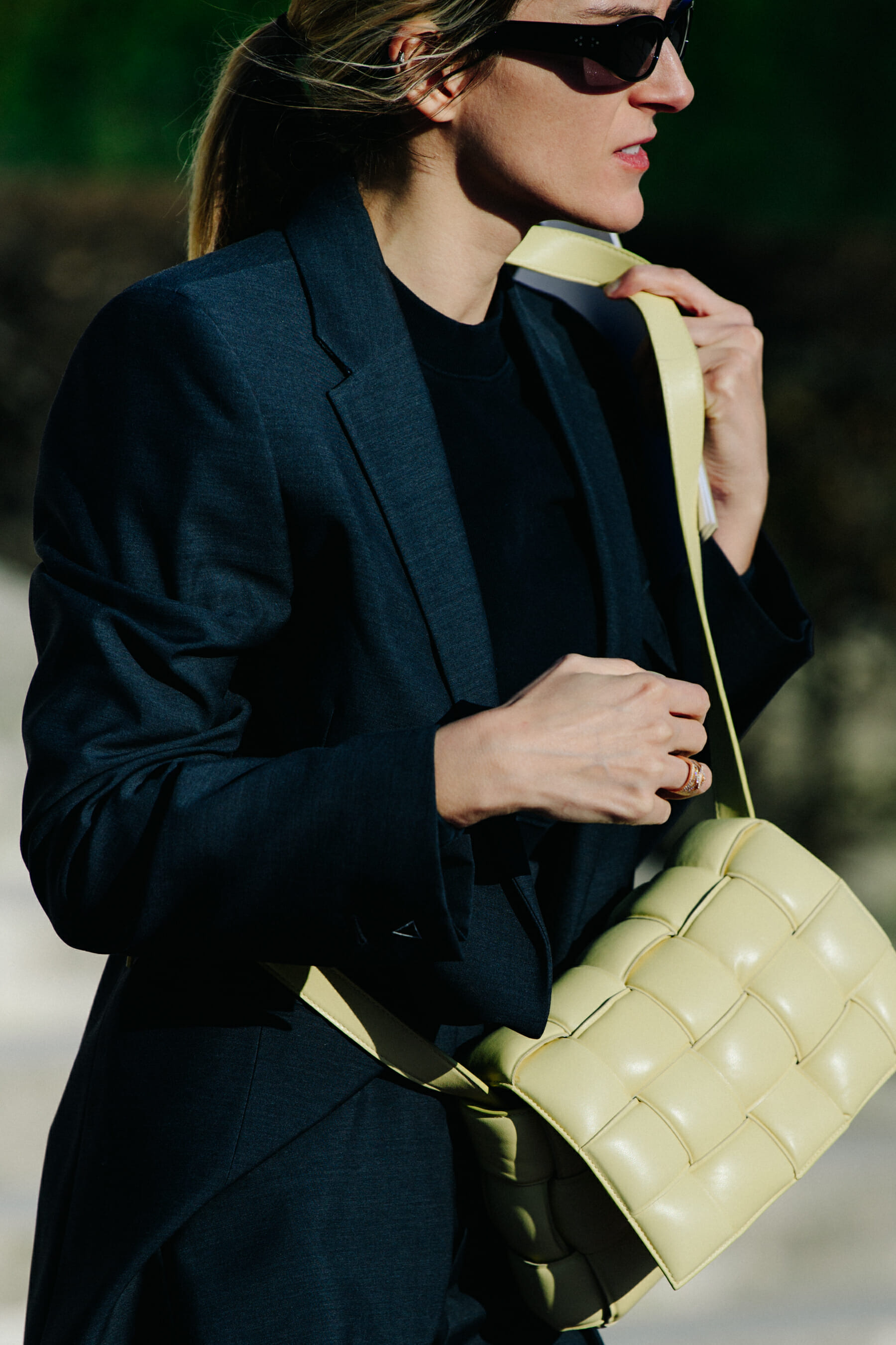 Woman carrying yellow bag