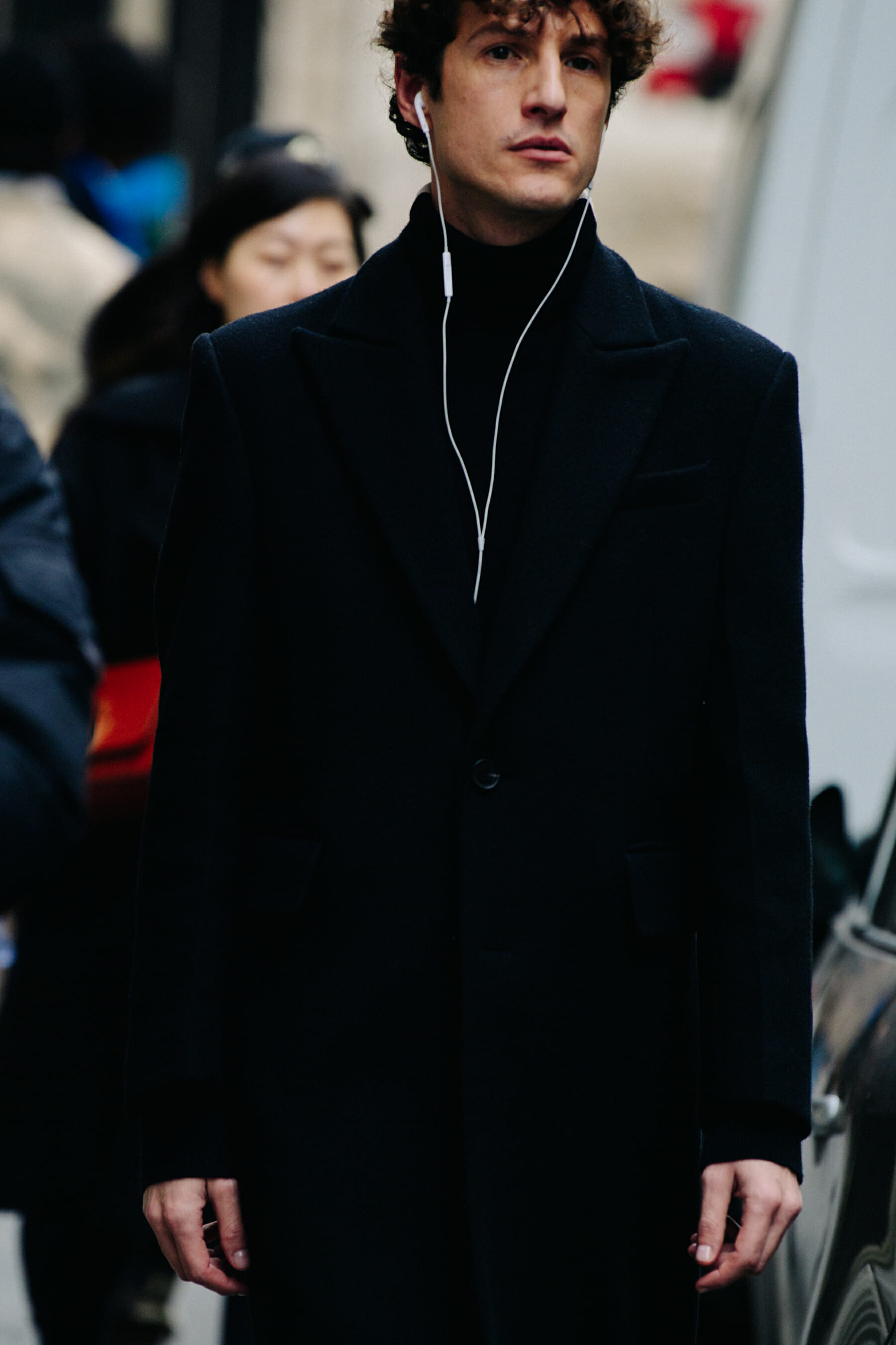 Man wearing black coat