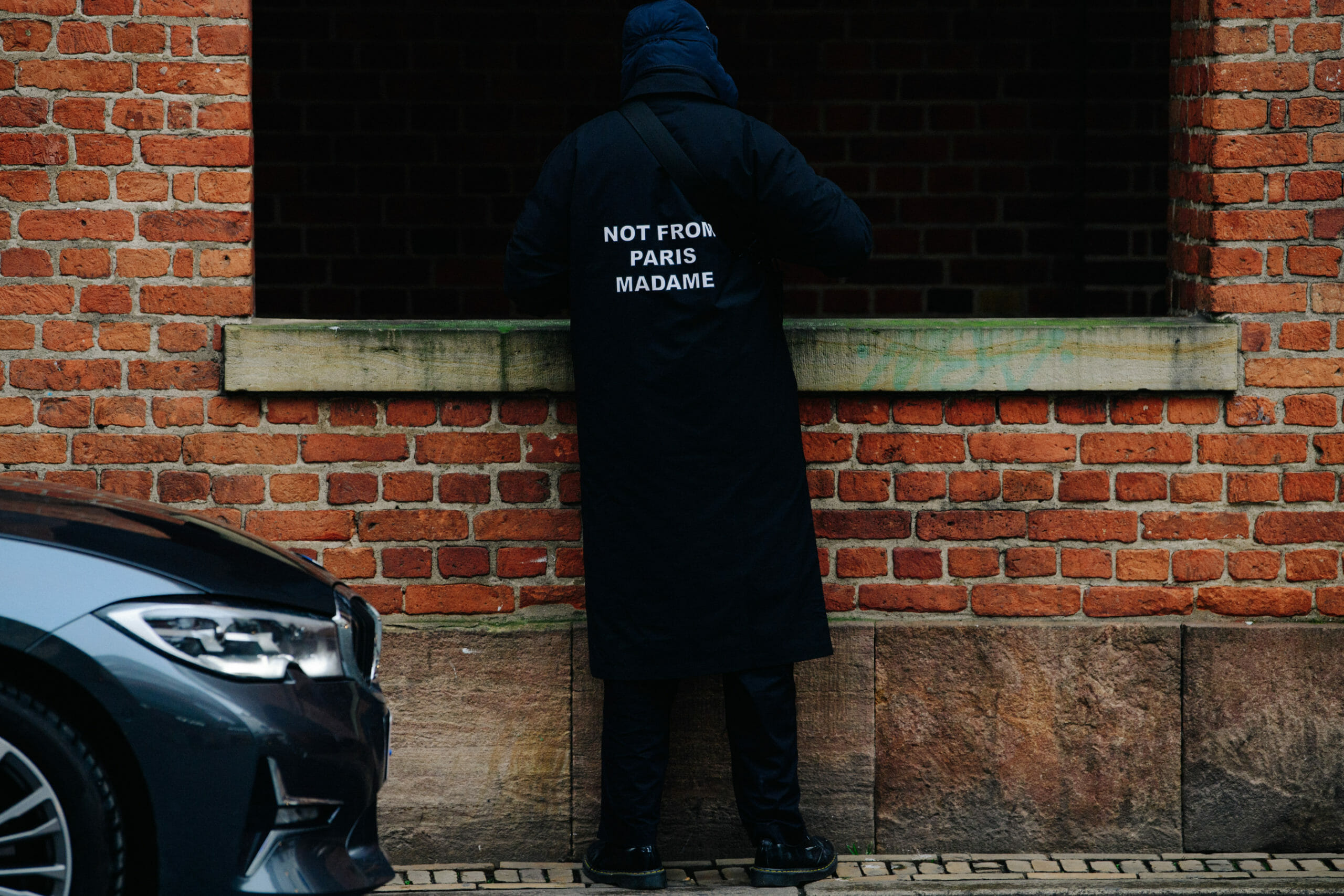 Man wearing black coat