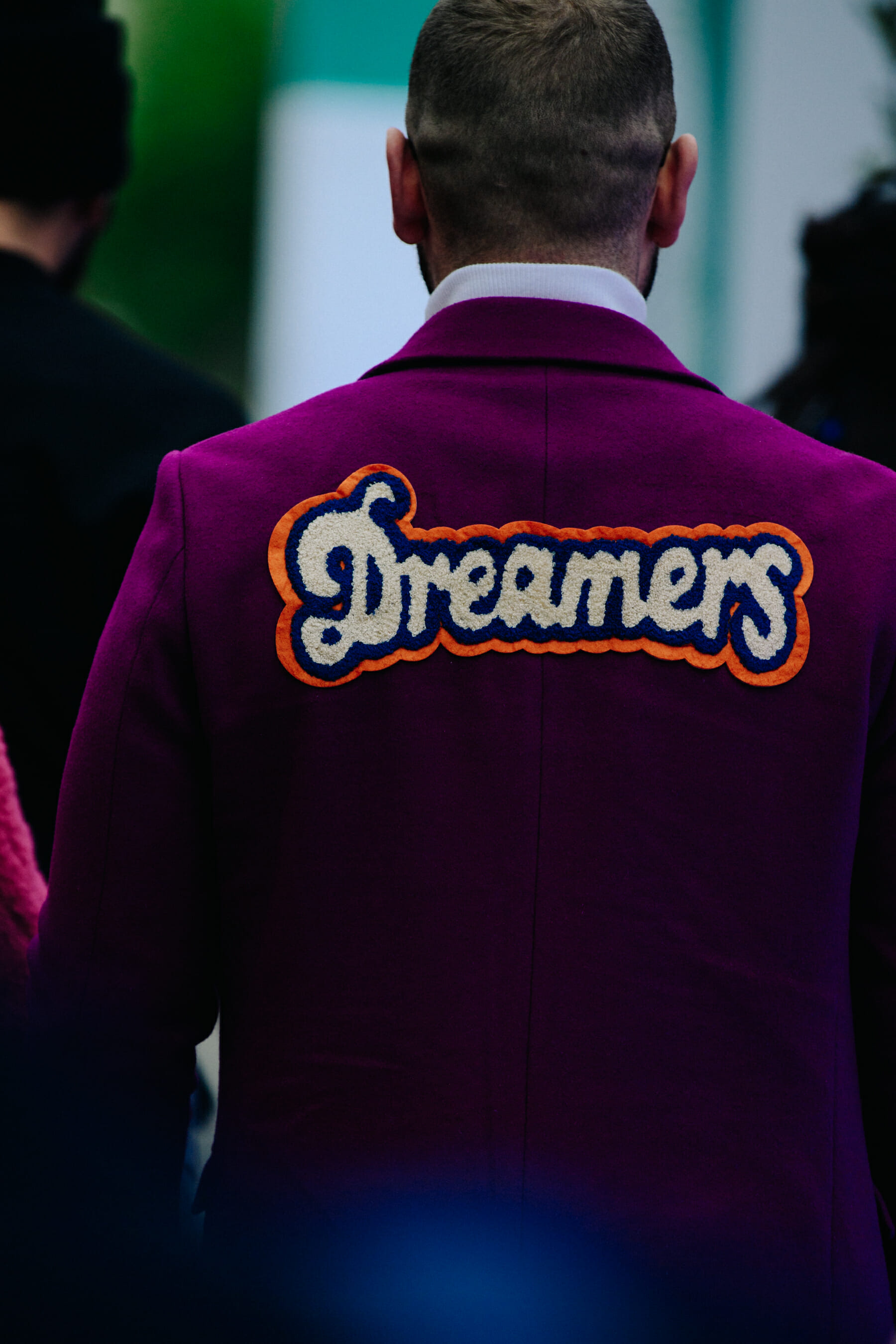 Man wearing purple jacket