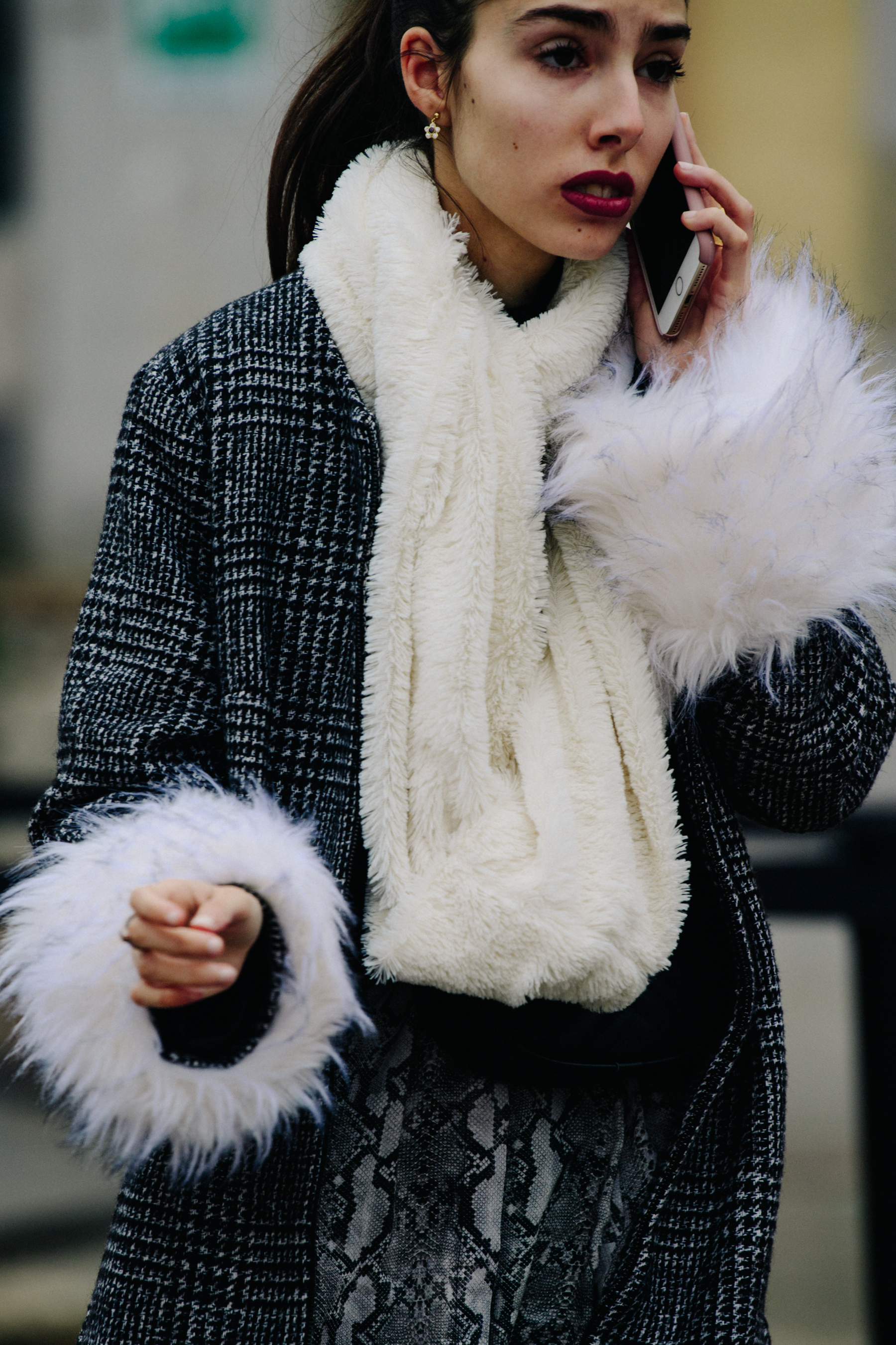 Model wearing white scarf