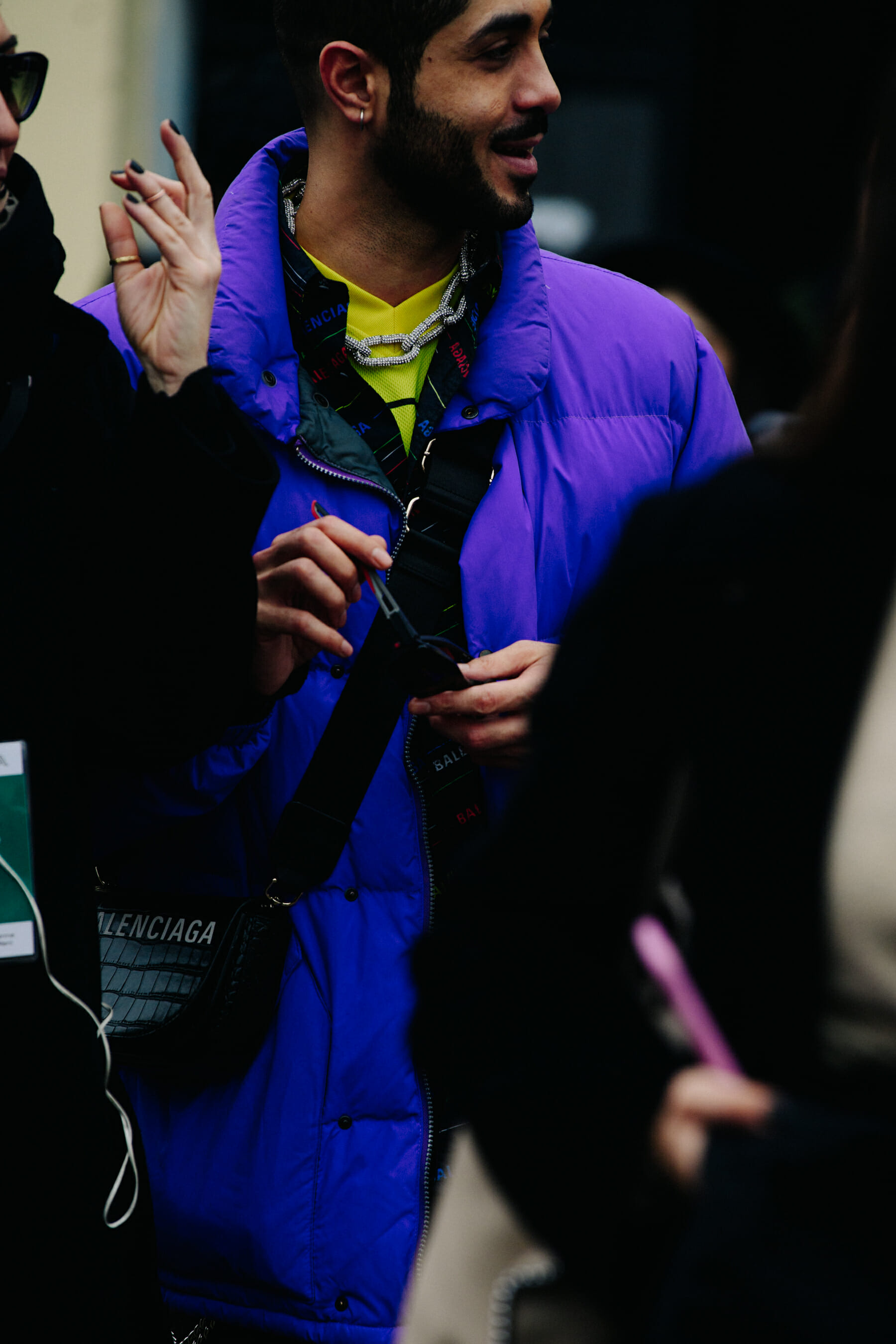 Man wearing purple coat