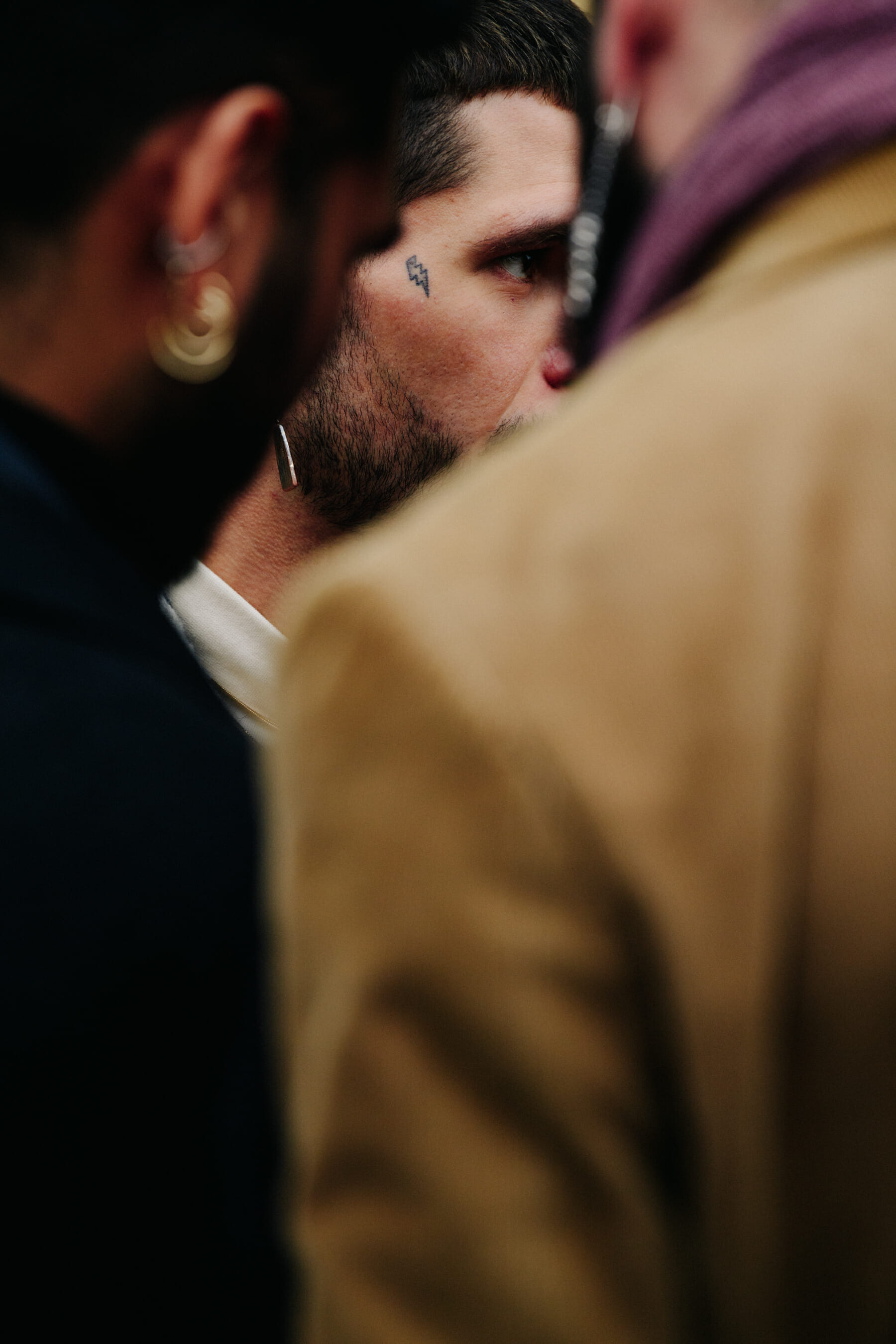 Man with face tattoo