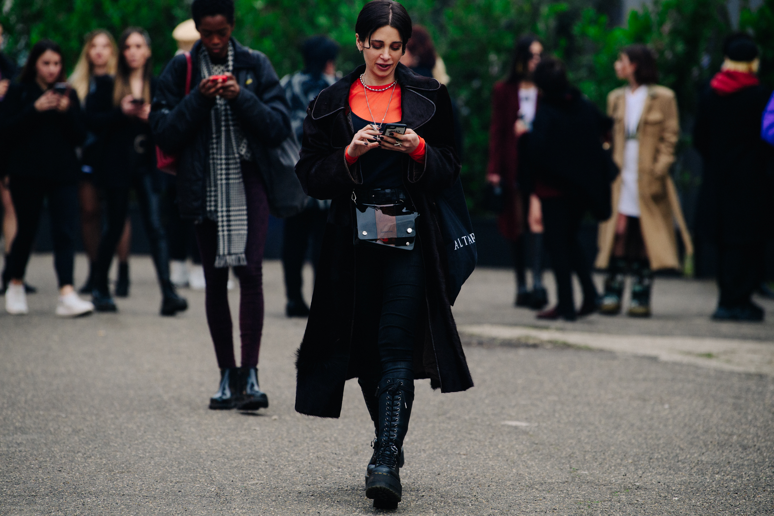 Woman wearing black boots