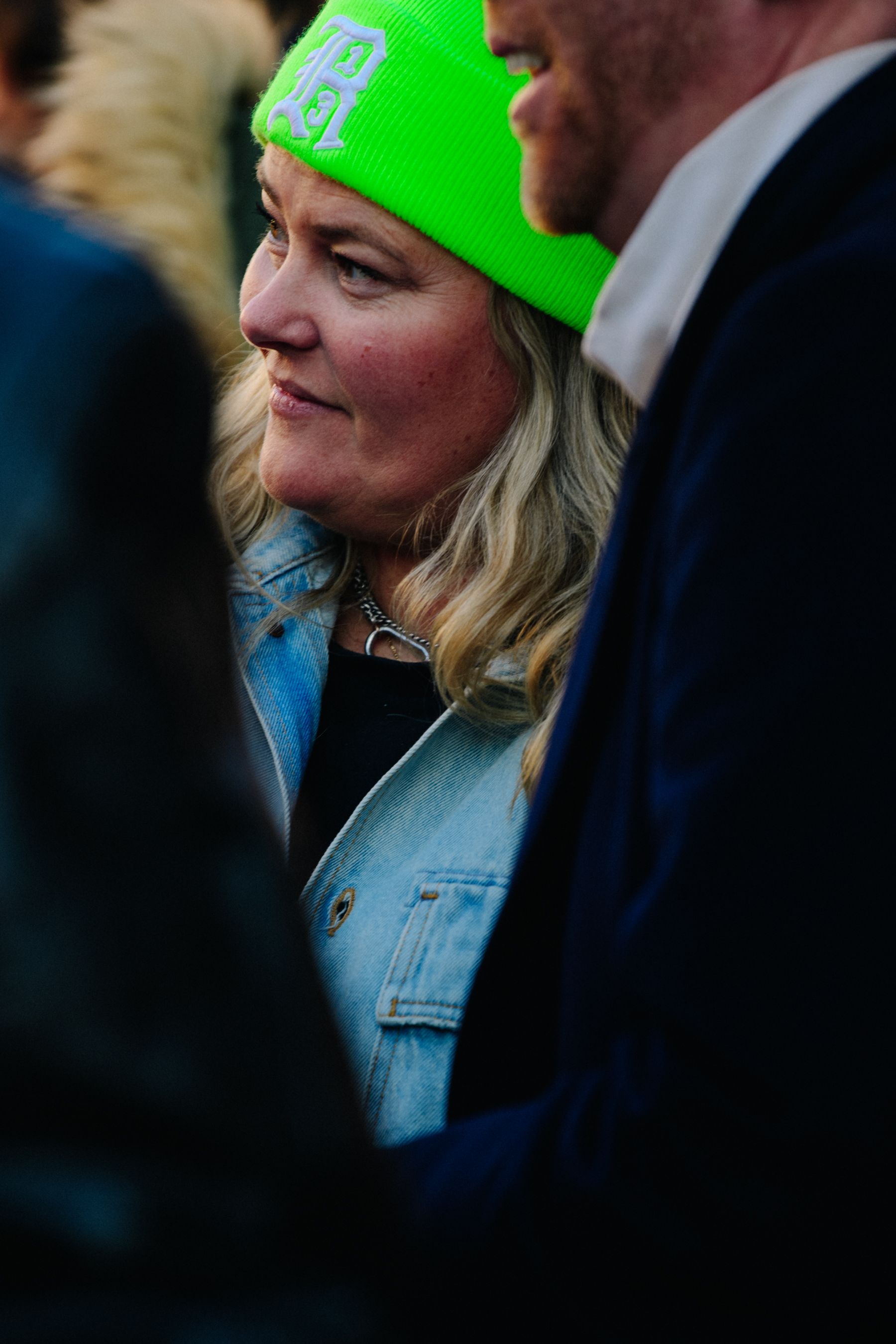 Woman wearing green beanie