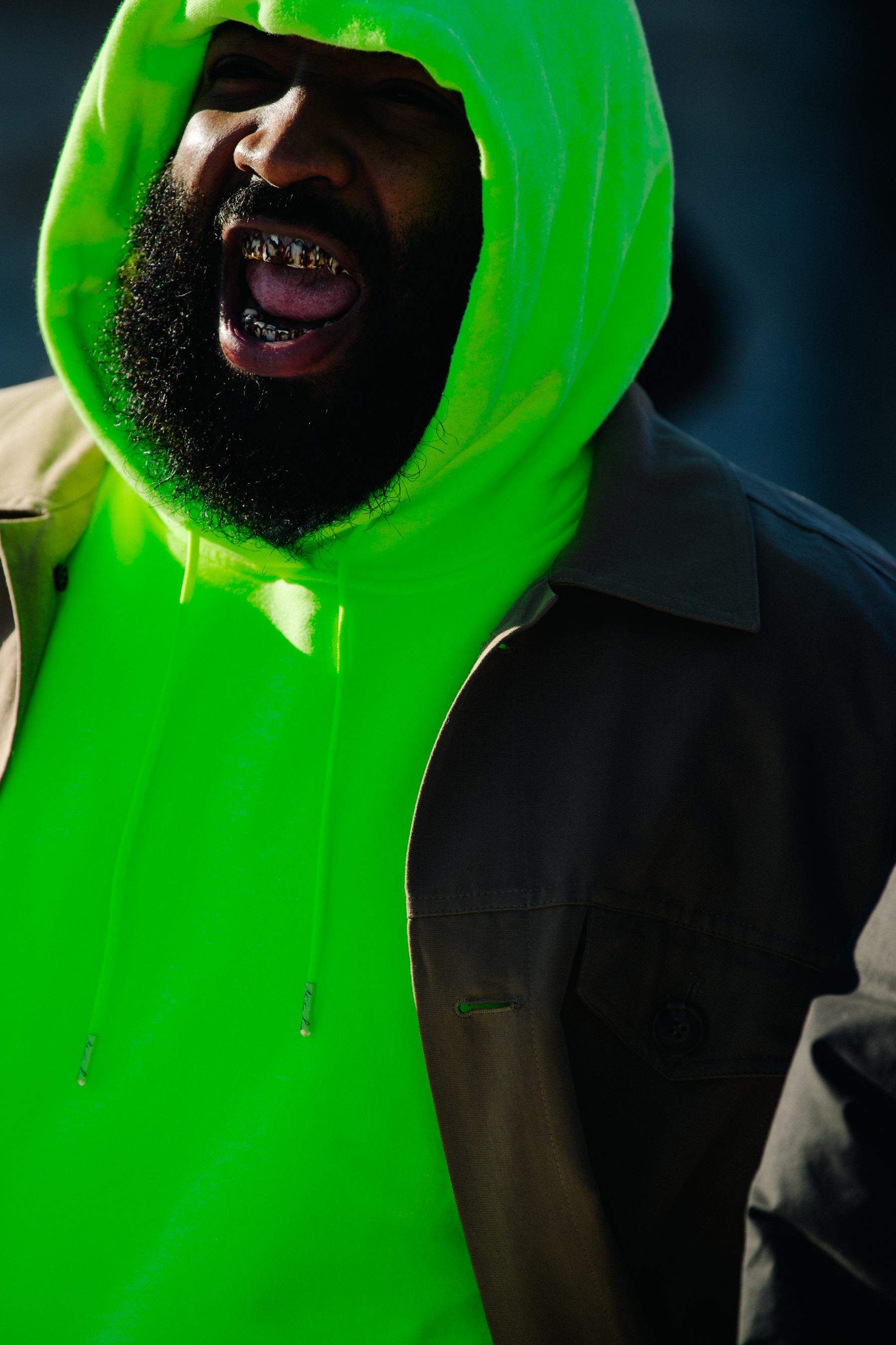 Man wearing green hoodie