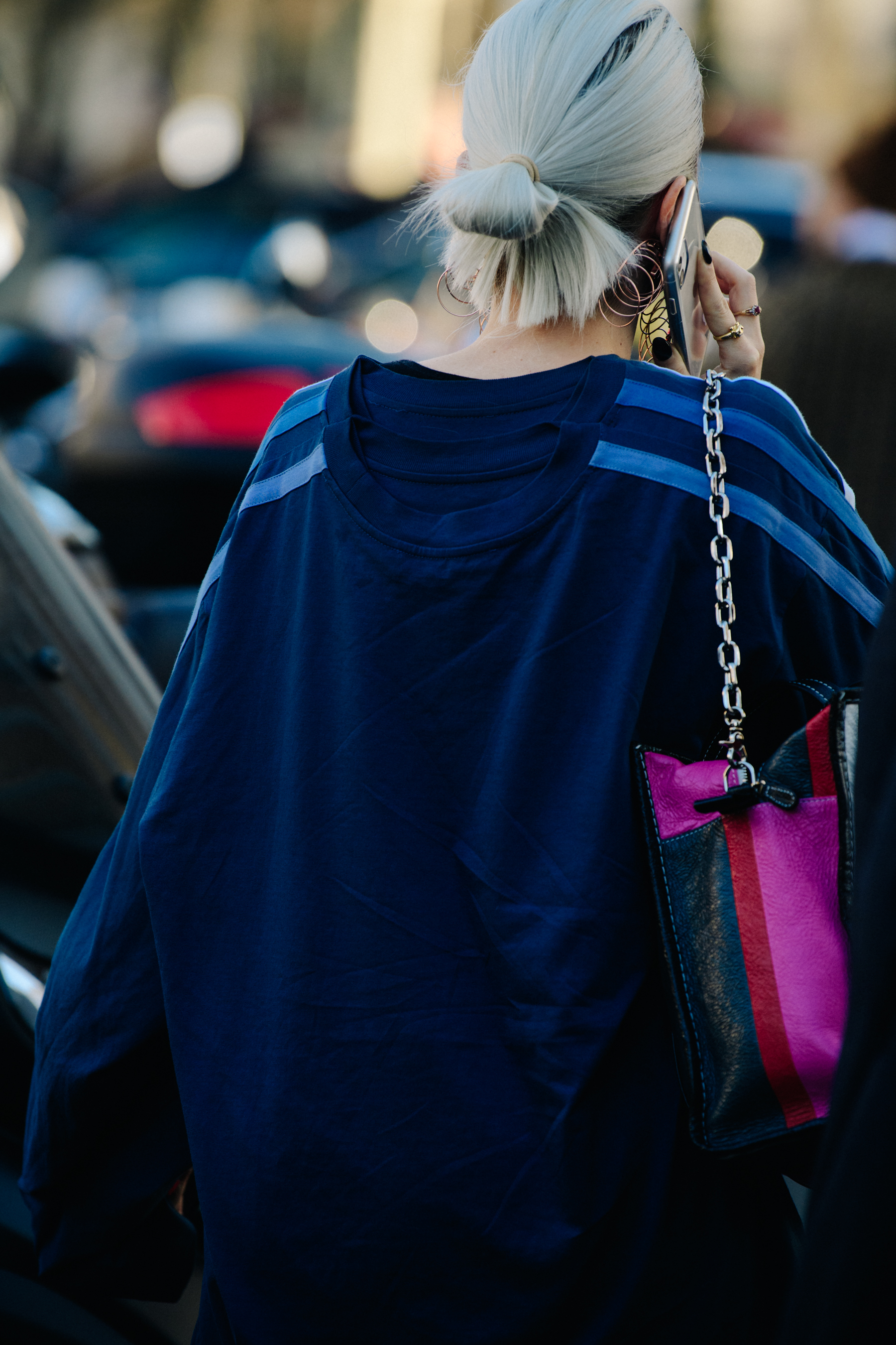Woman carrying pink bag