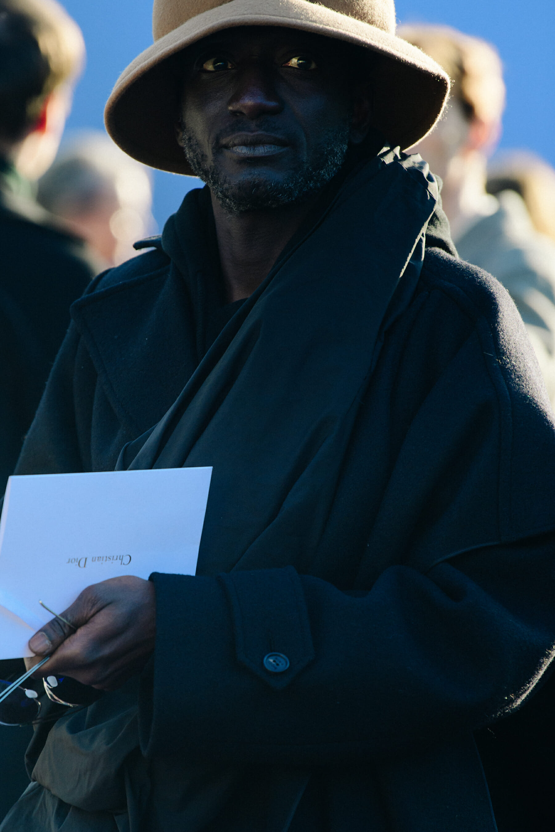 Man wearing black coat