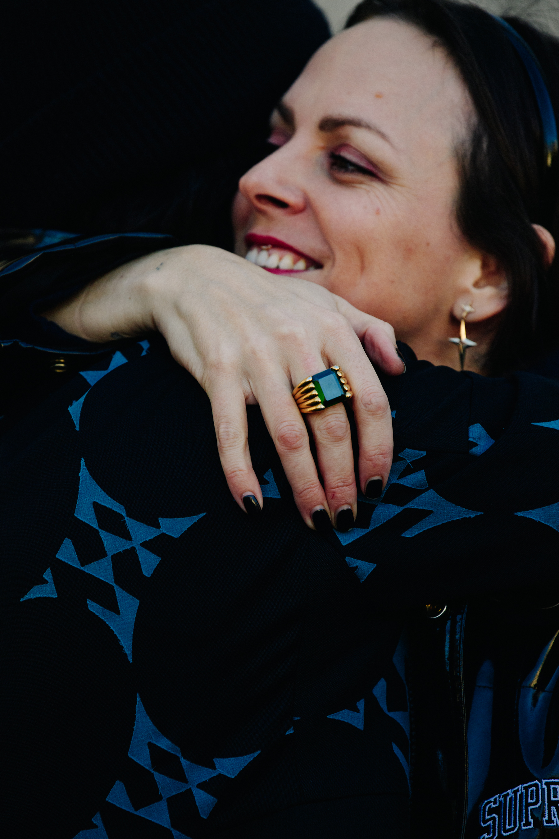 Woman wearing black ring