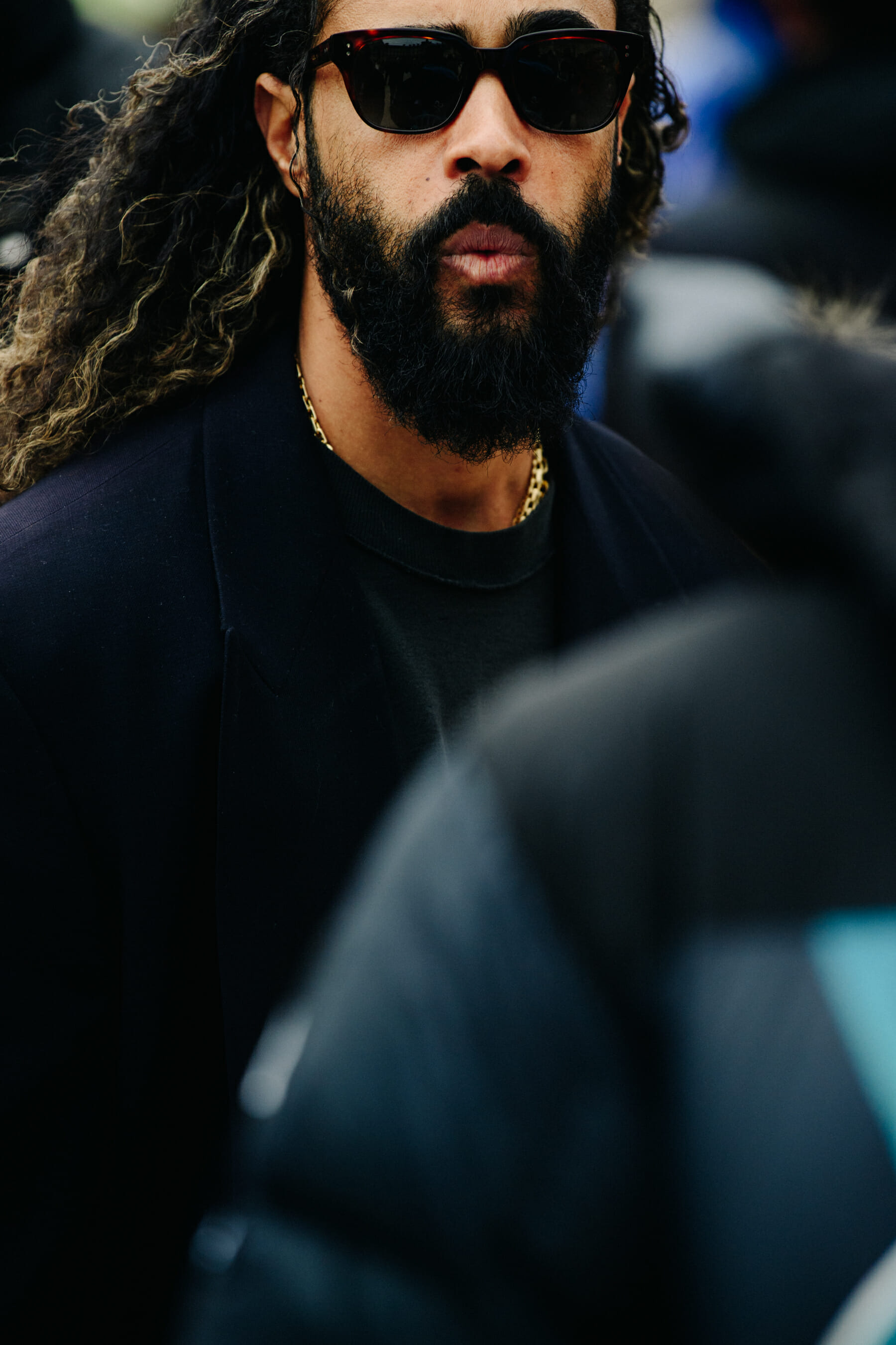 Man wearing dark sunglasses