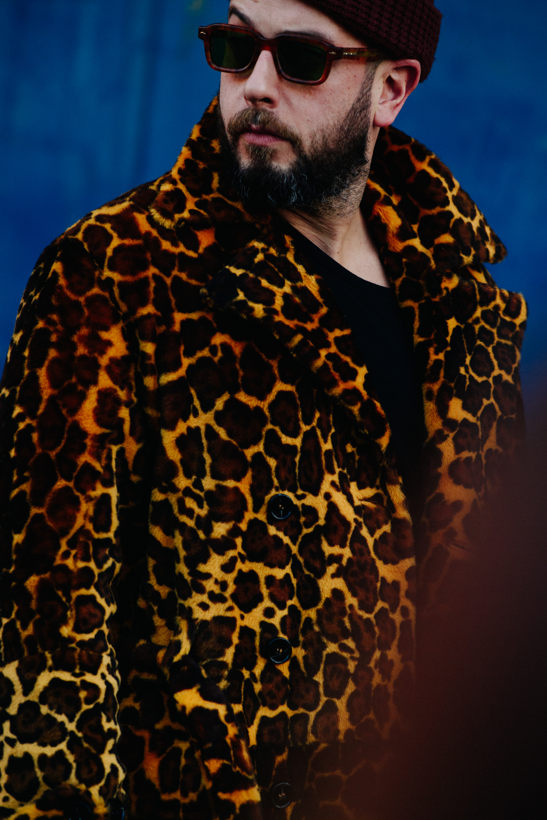 Man wearing animal print coat