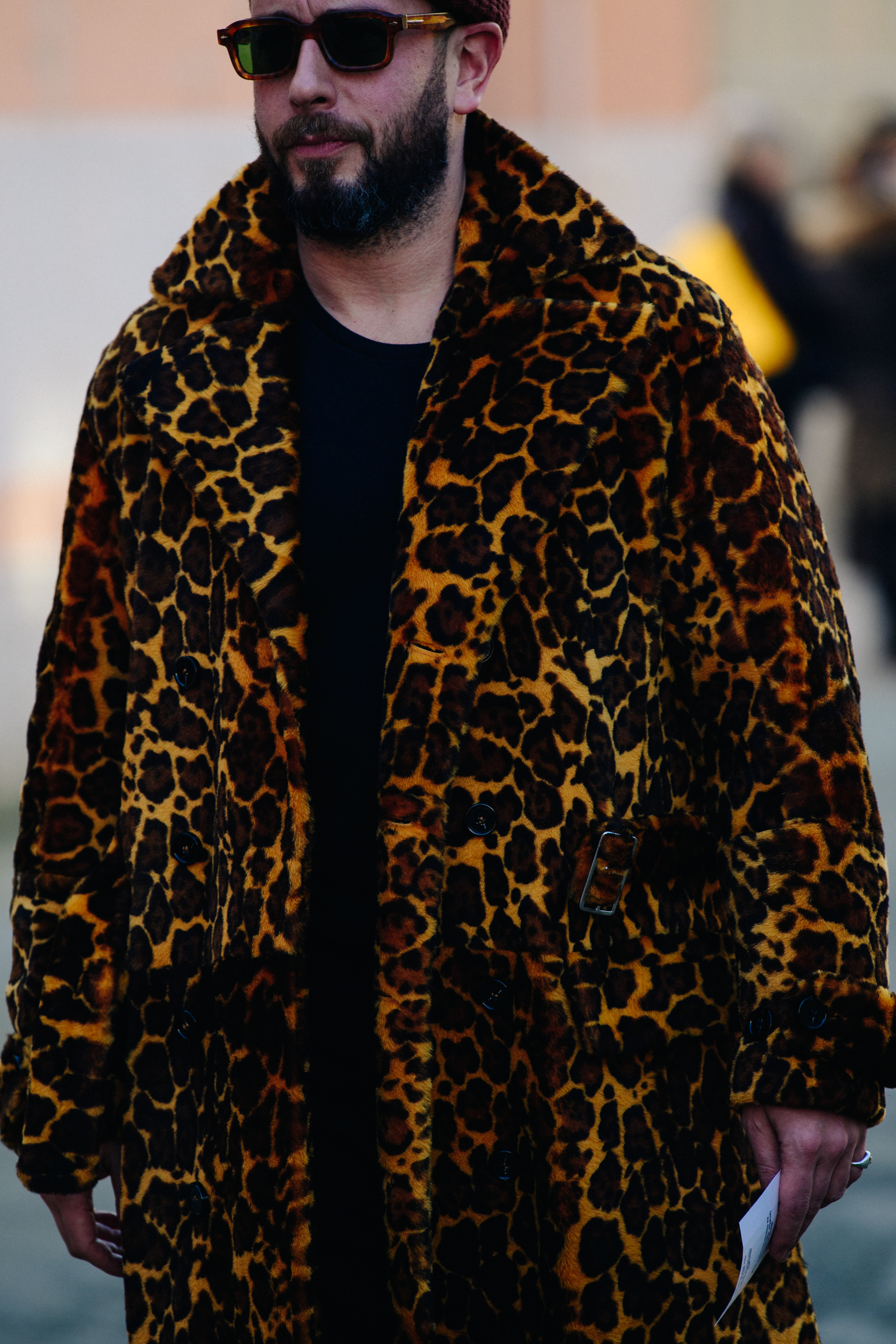 Man wearing animal print coat
