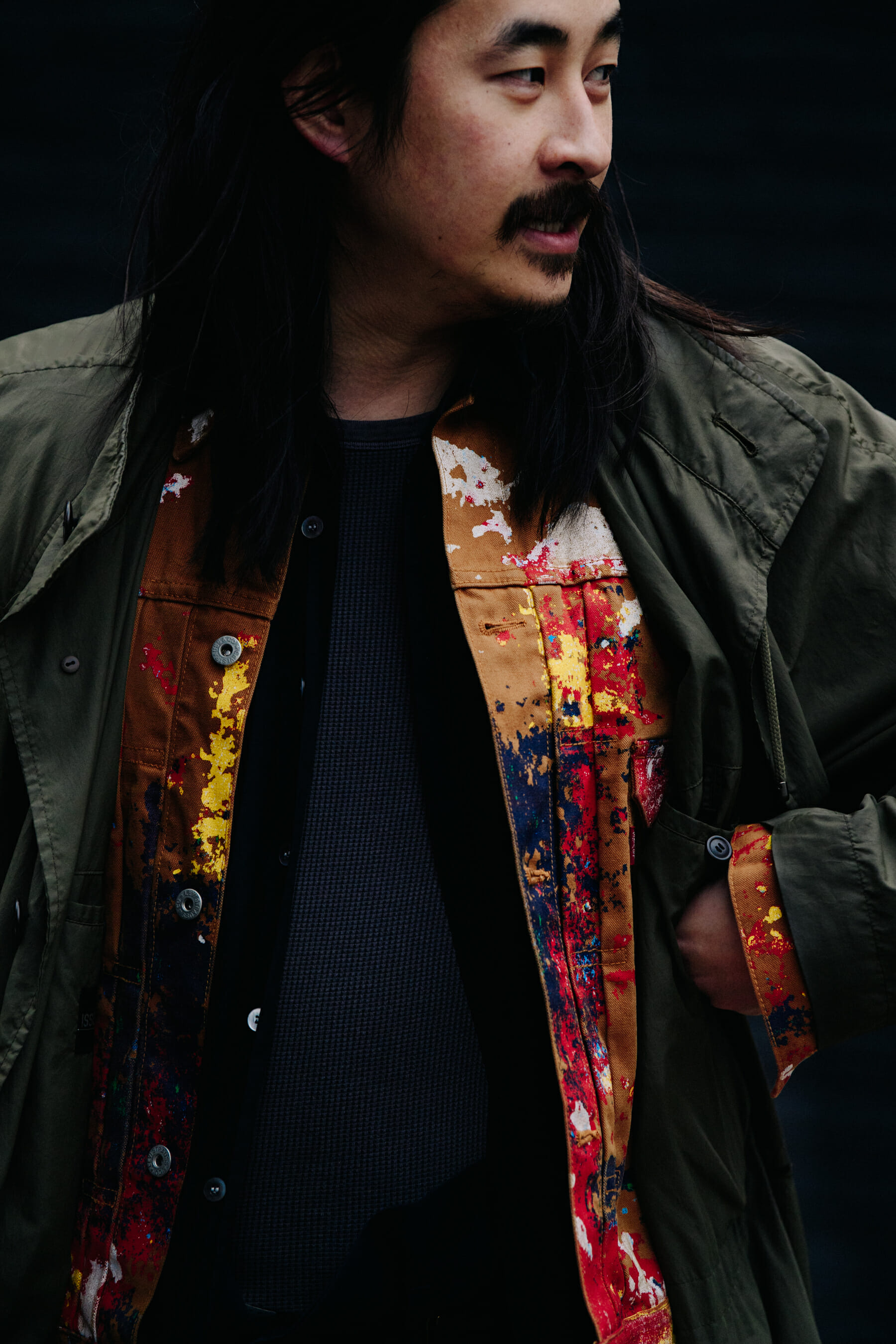 Chinese man wearing painted denim