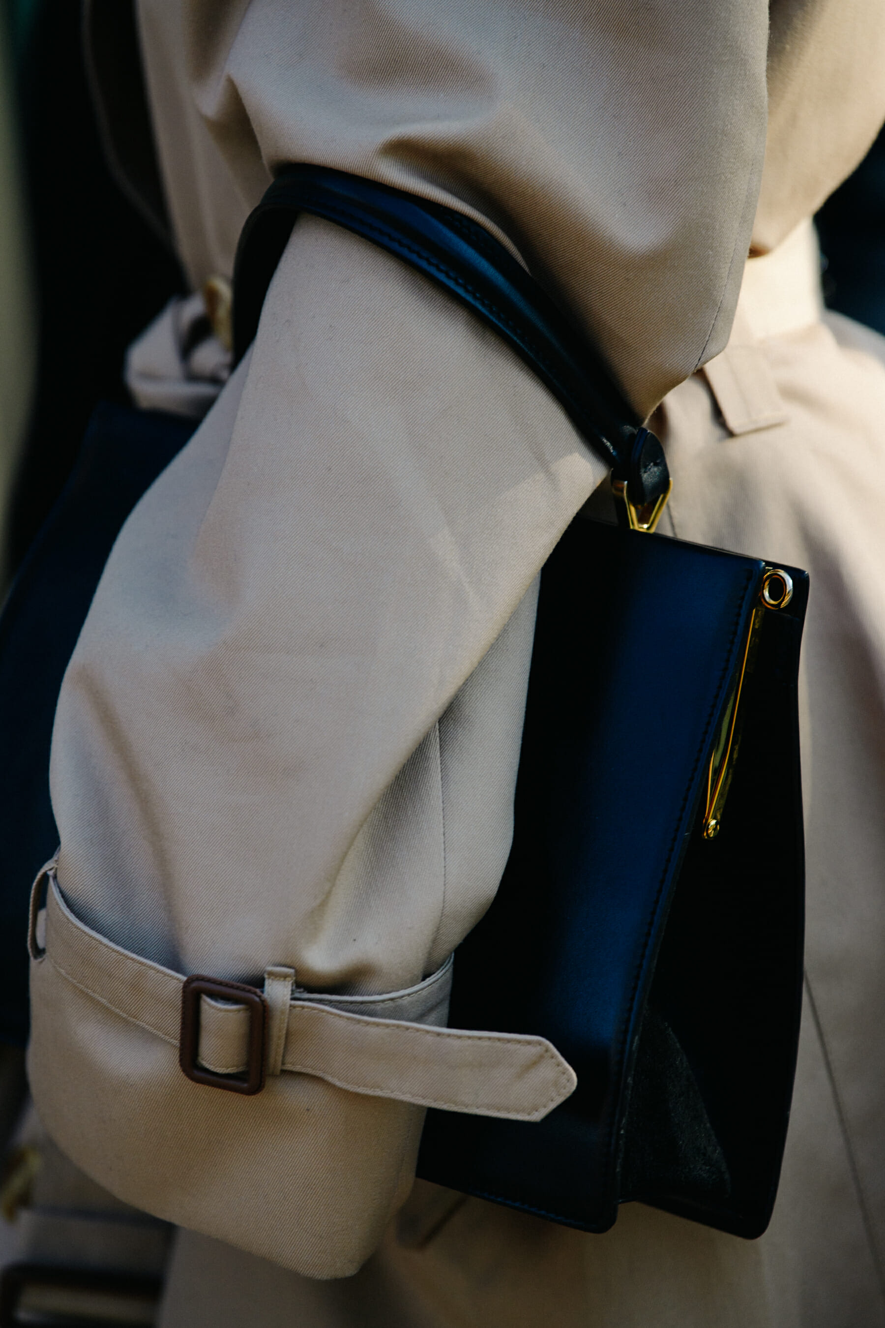 Woman wearing tan coat