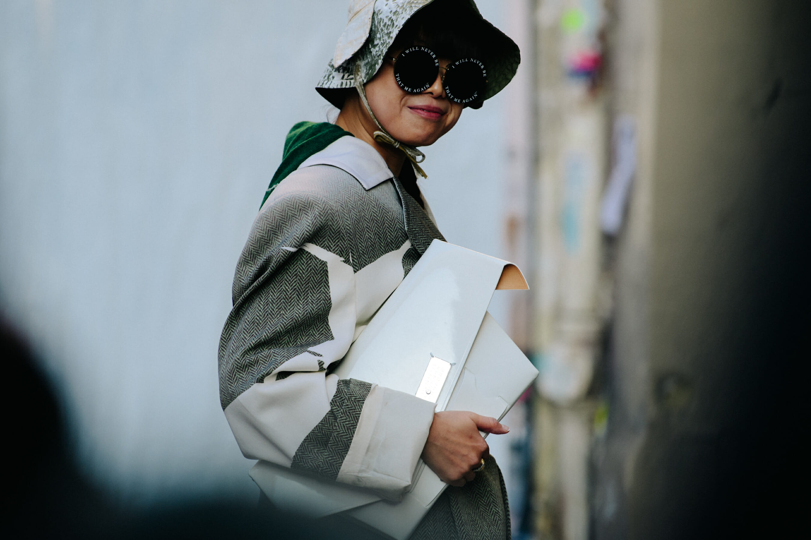 Woman wearing large sunglasses