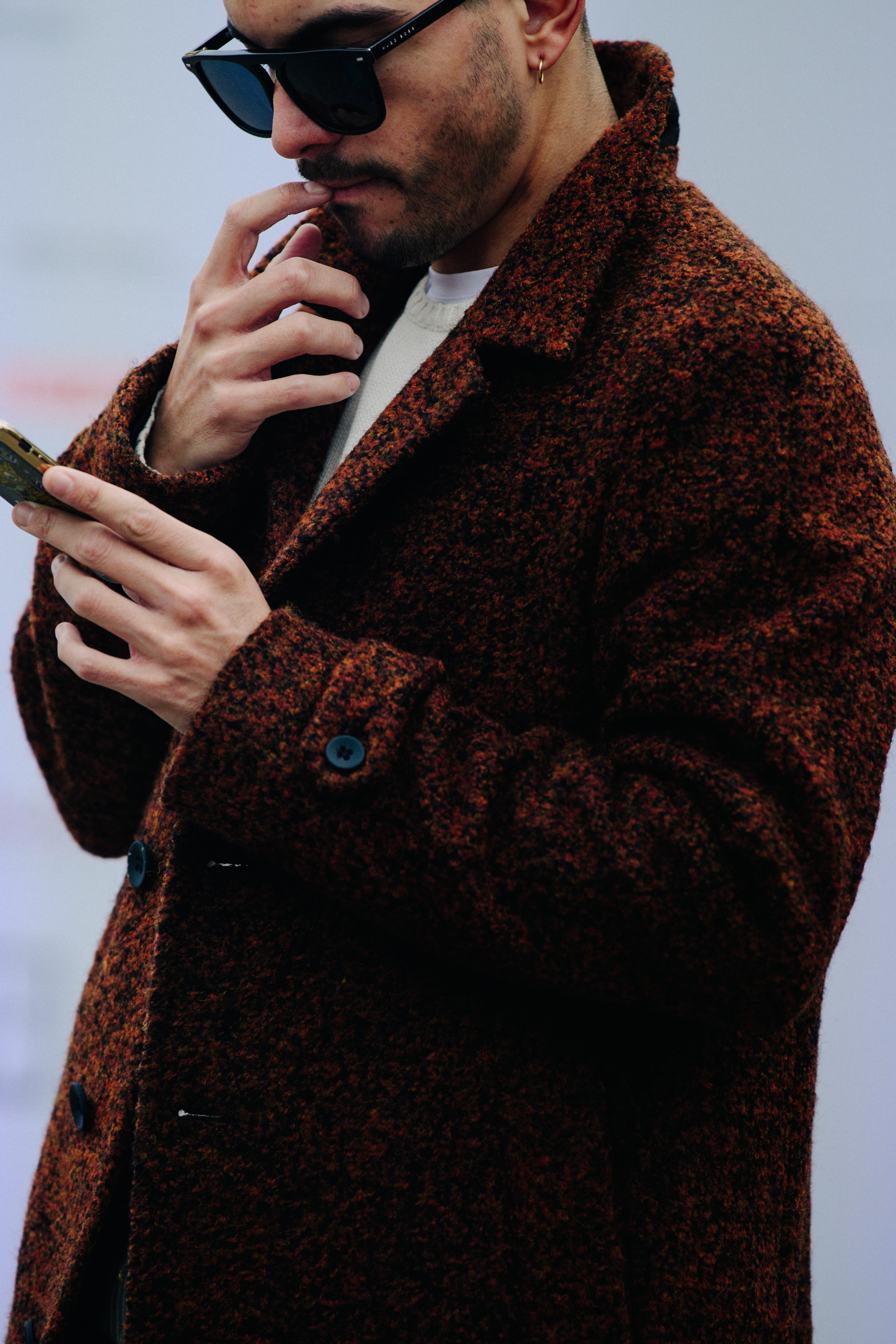 Man wearing brown coat