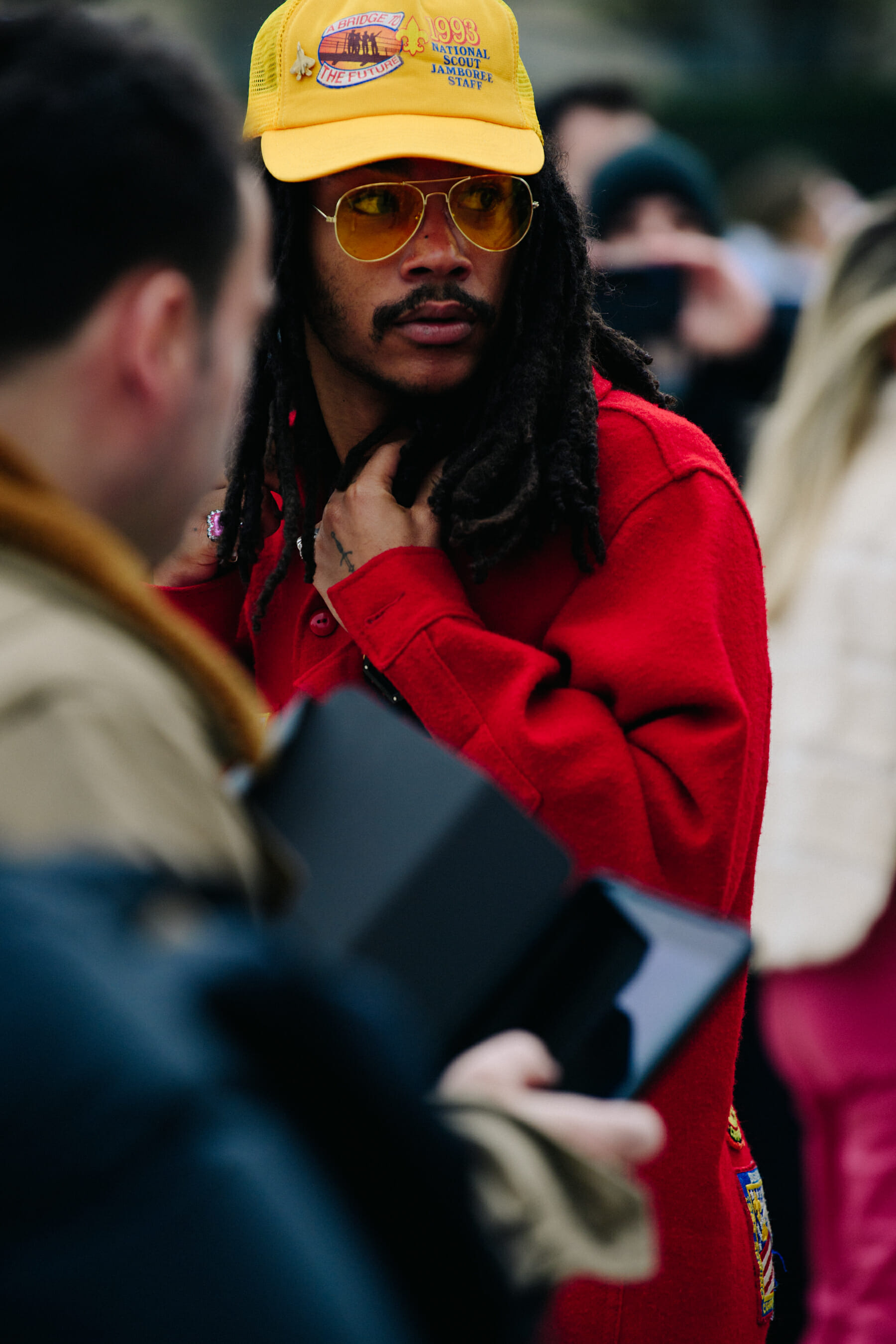 Man wearing yellow cap