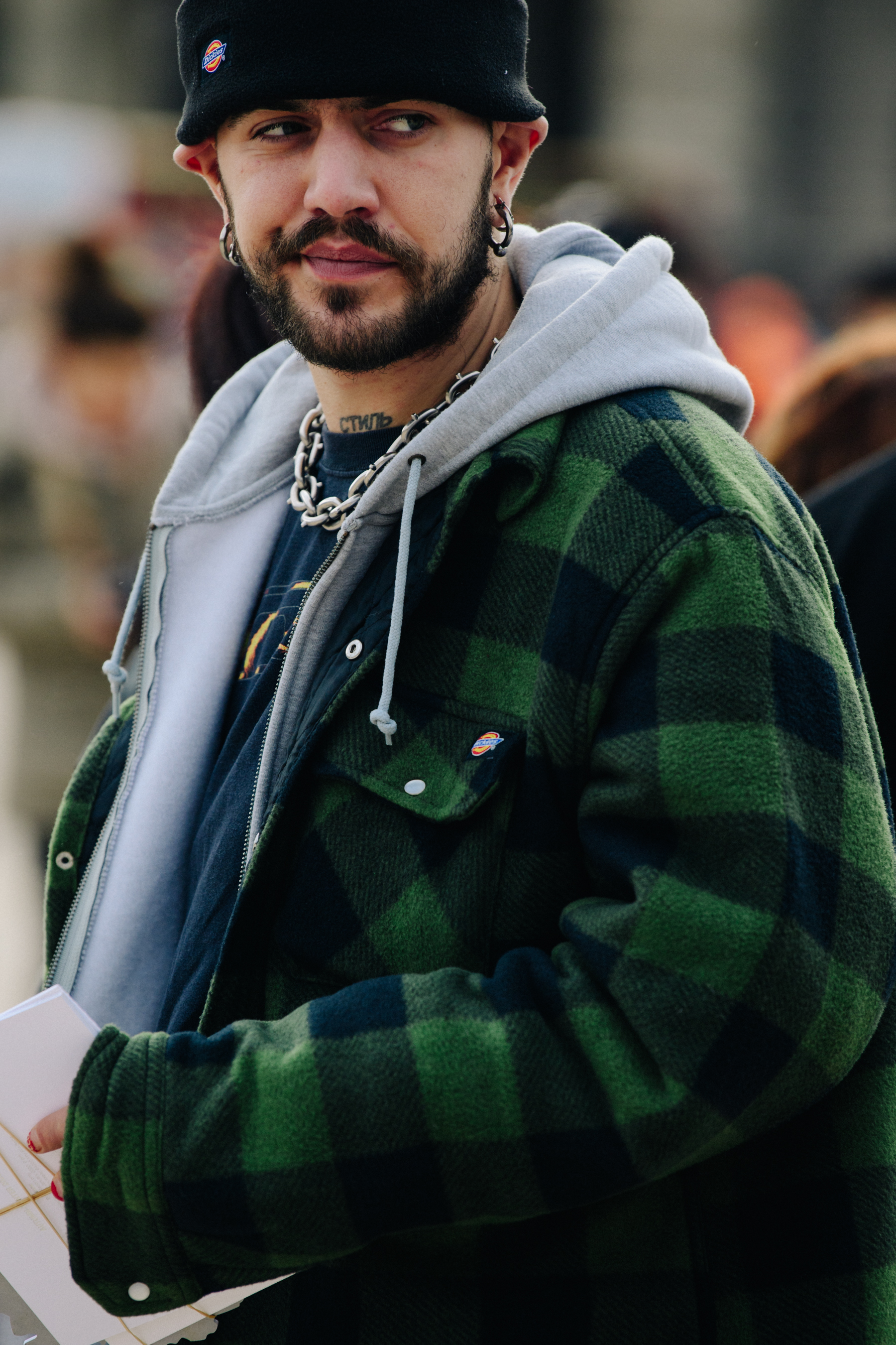 Man wearing green Dickies shirt