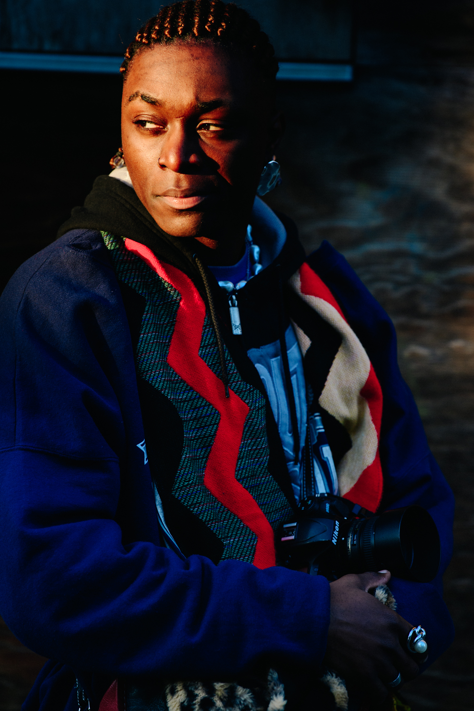 Man with cornrows