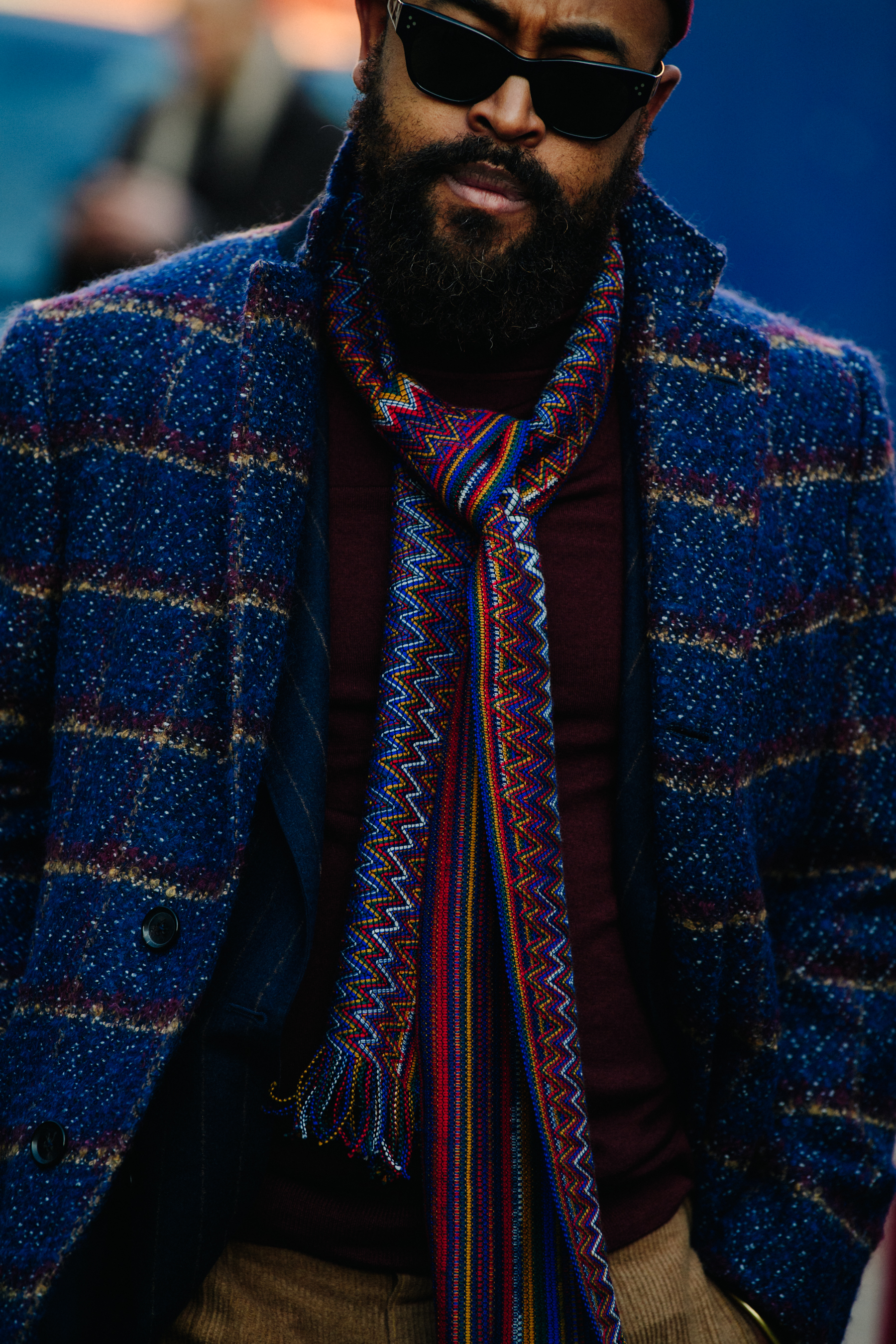 Man wearing colourful scarf