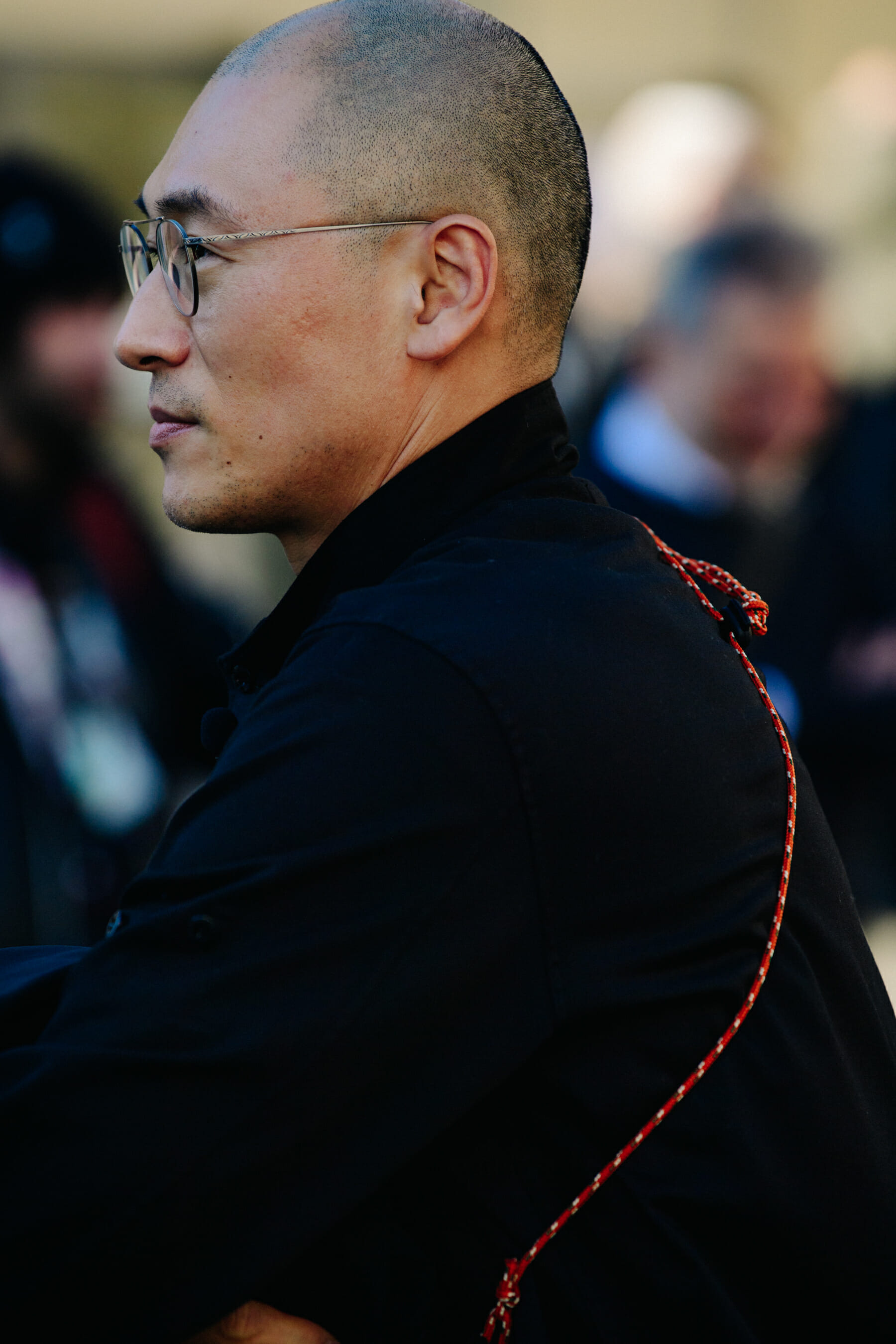 Man wearing red string bag