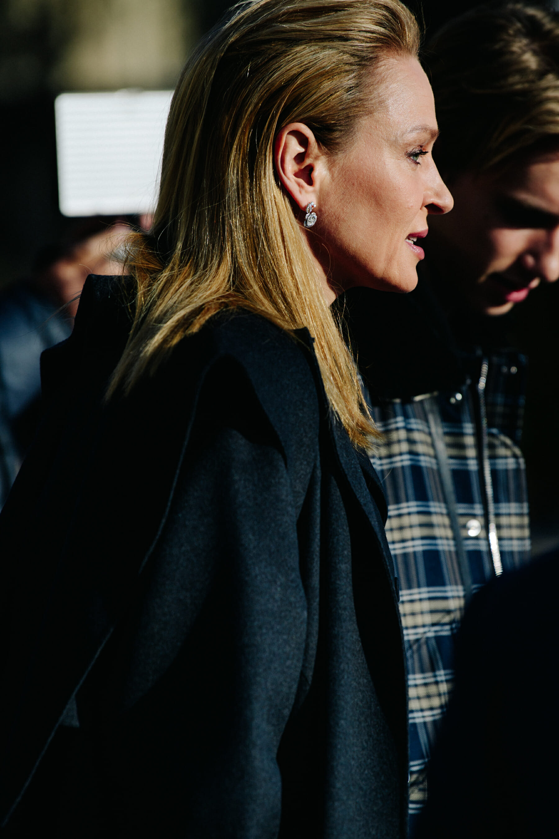 Actress wearing grey coat