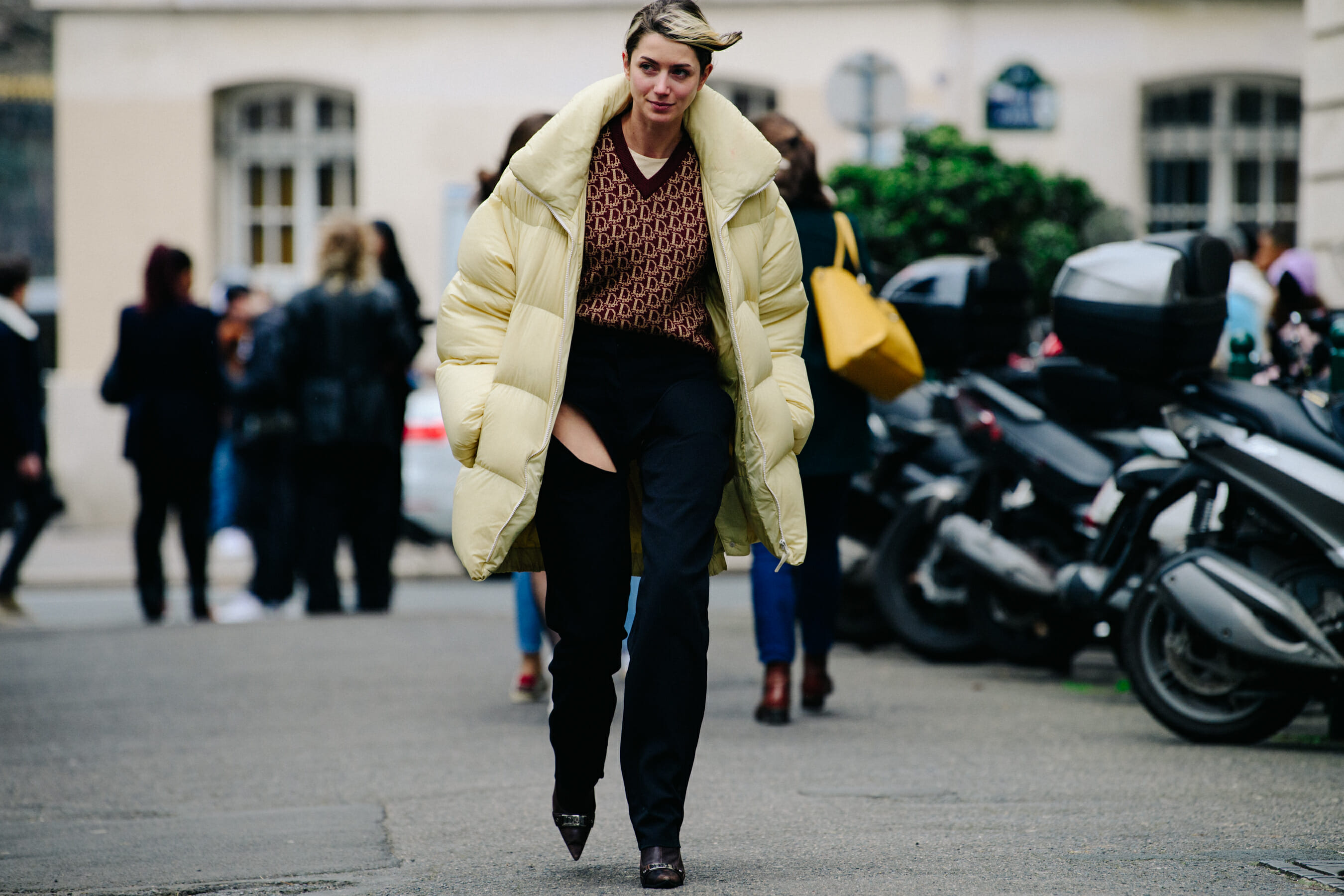 Woman wearing large coat