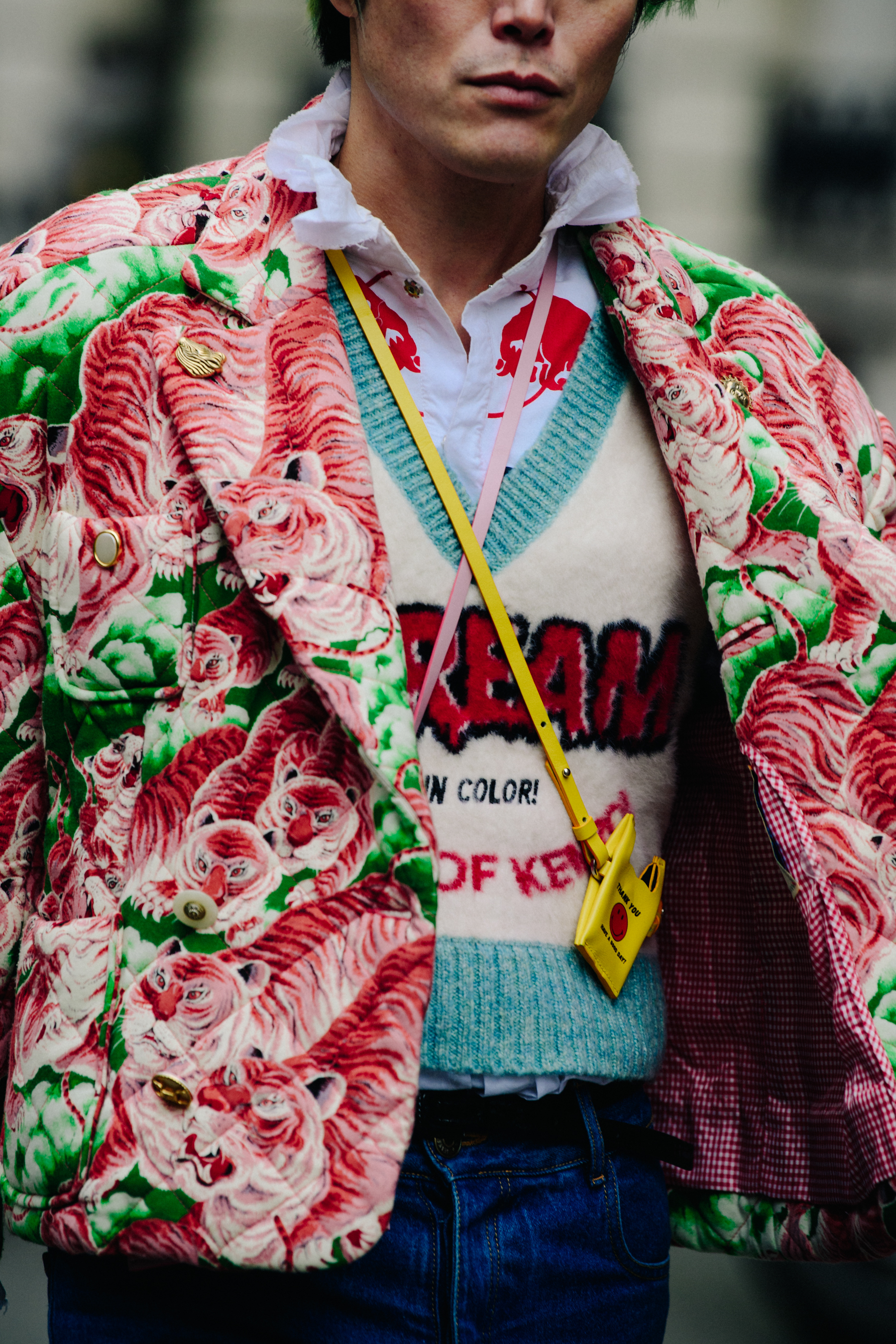 Man wearing pink floral jacket