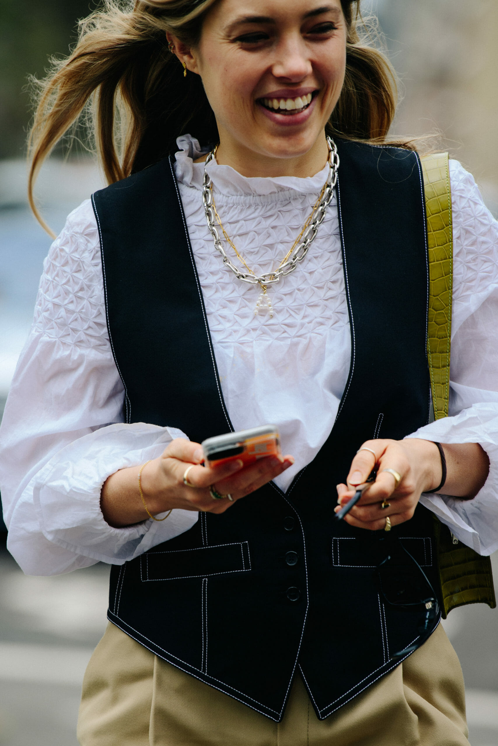 Woman wearing black waistcoat