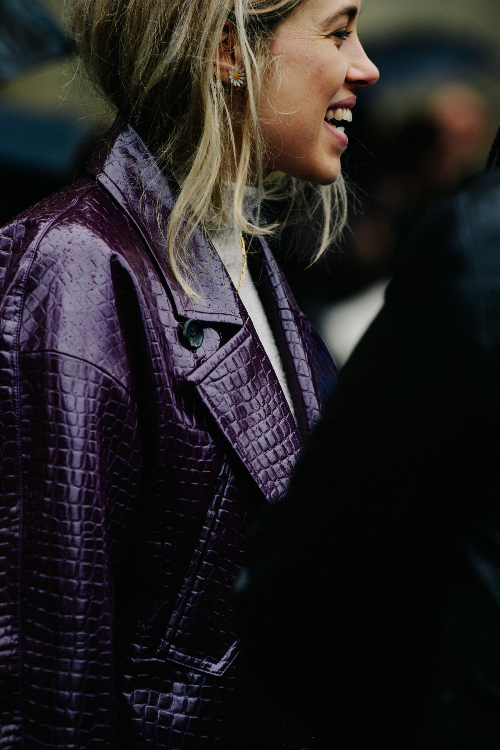 Woman wearing daisy earring