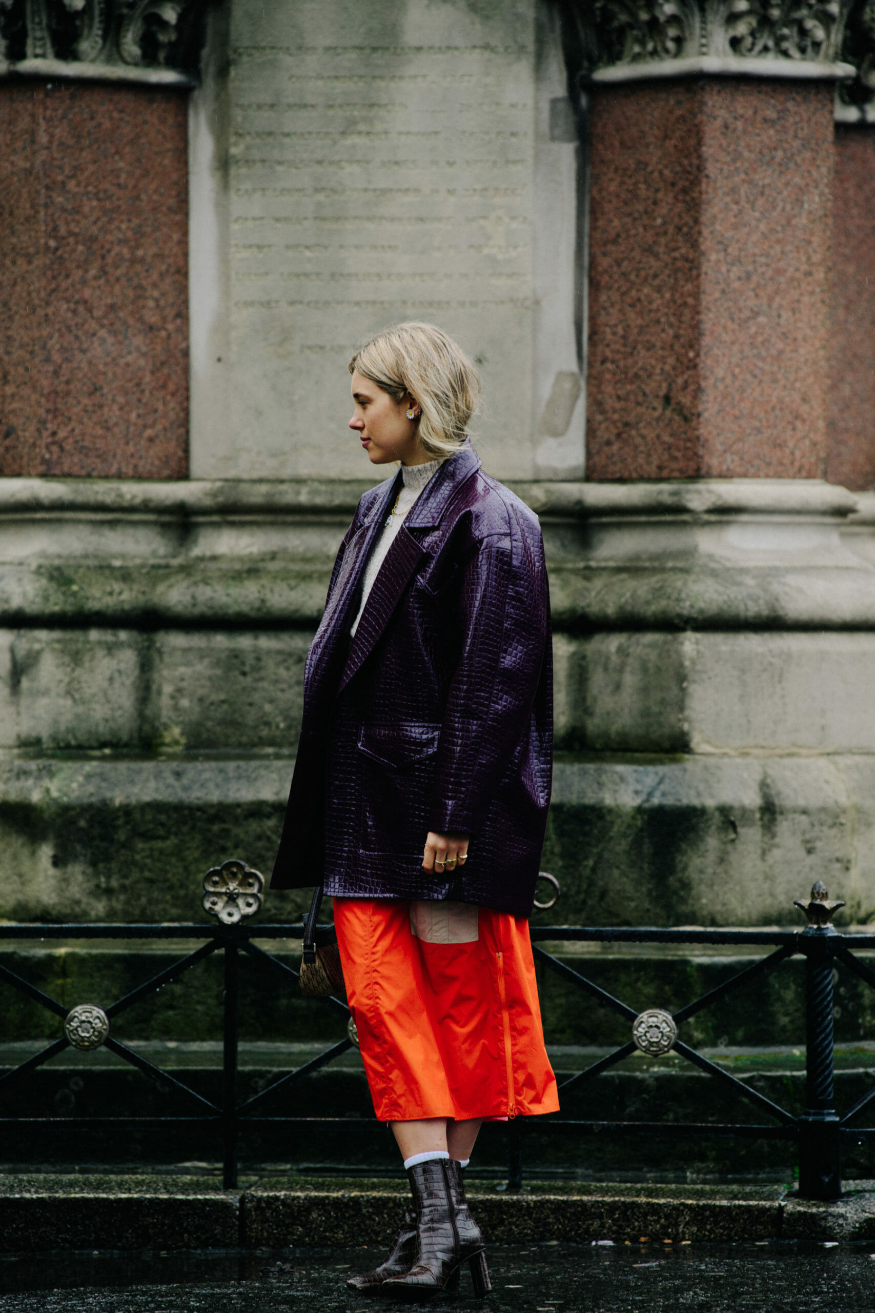 Woman wearing orange skirt
