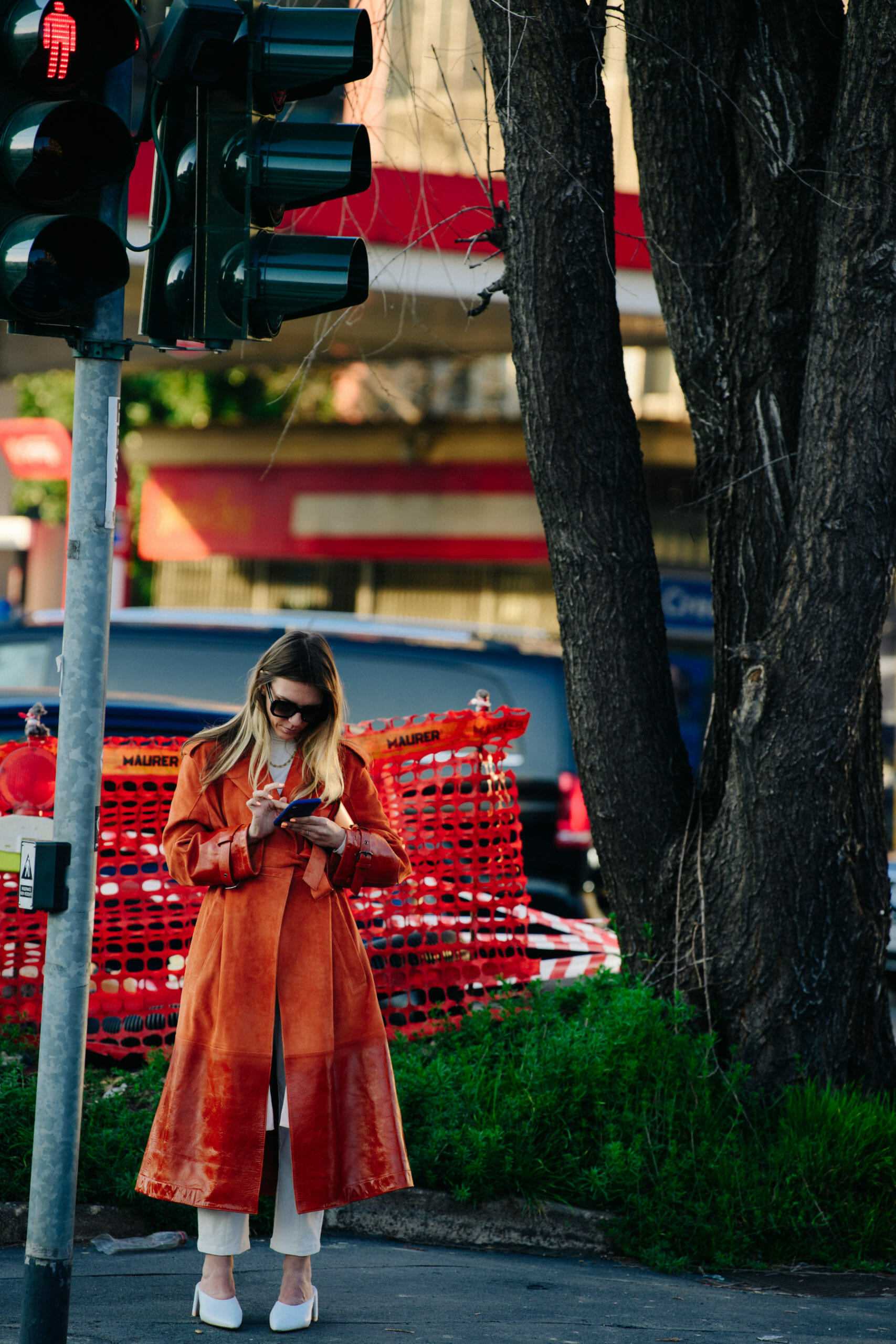 Woman wearing orange coat