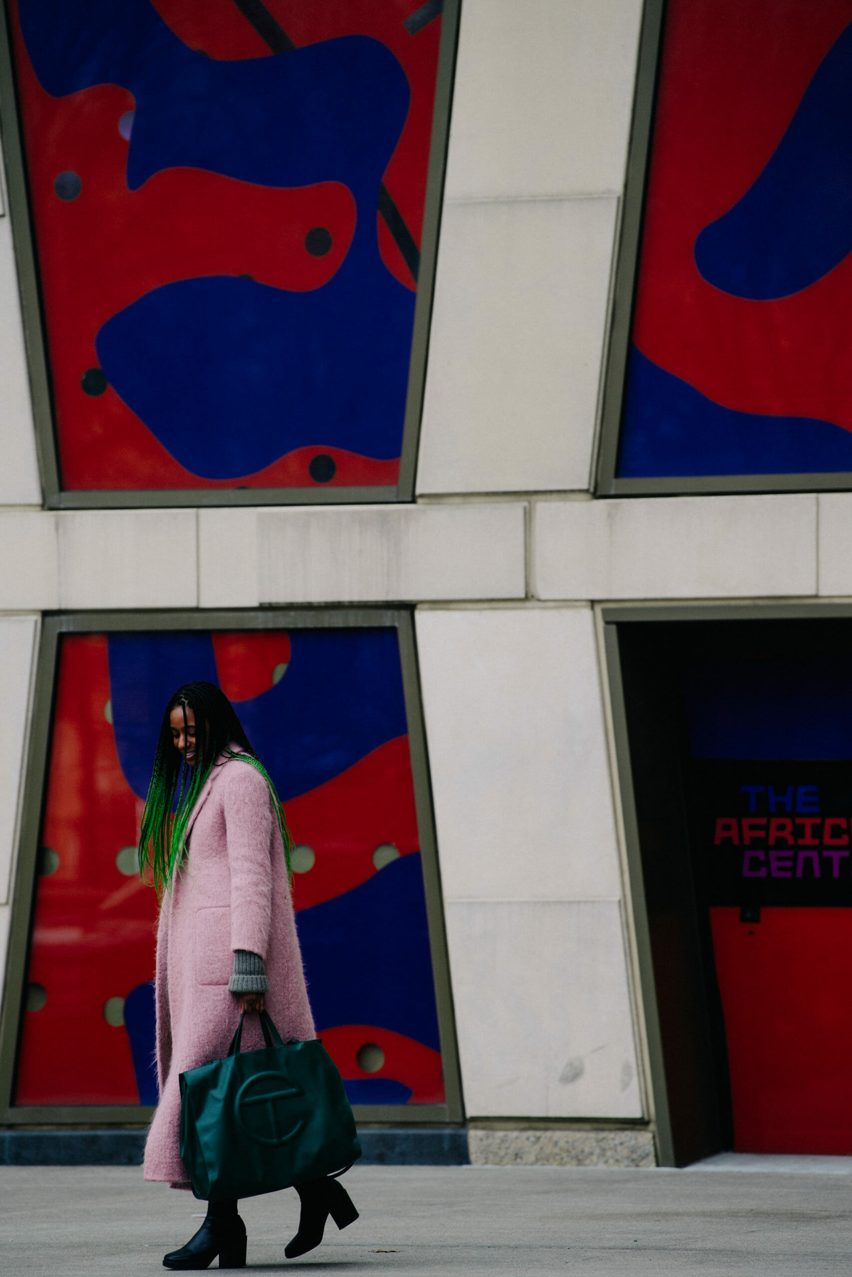 Woman wearing pink coat