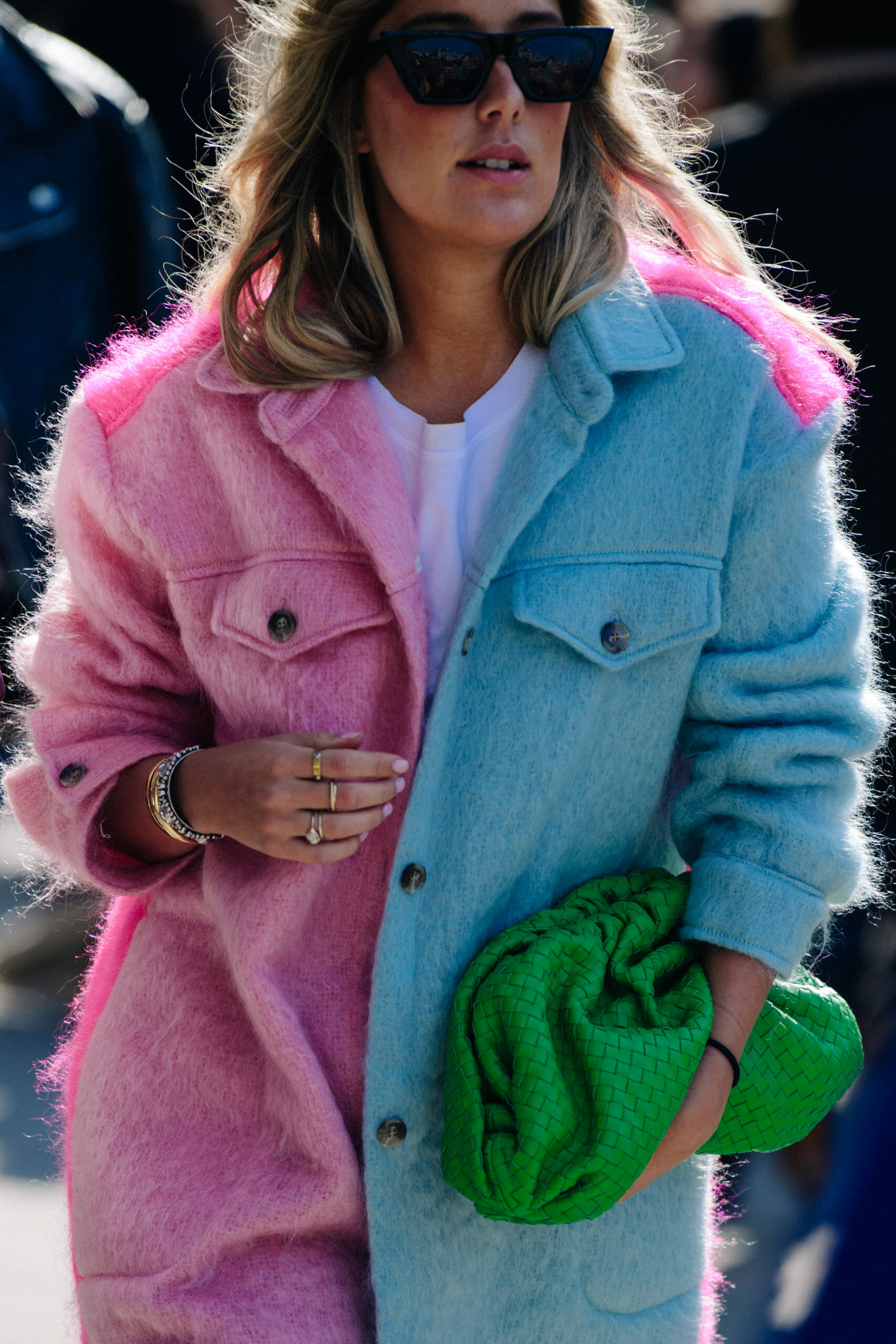 Woman wearing fluffy blue and pink