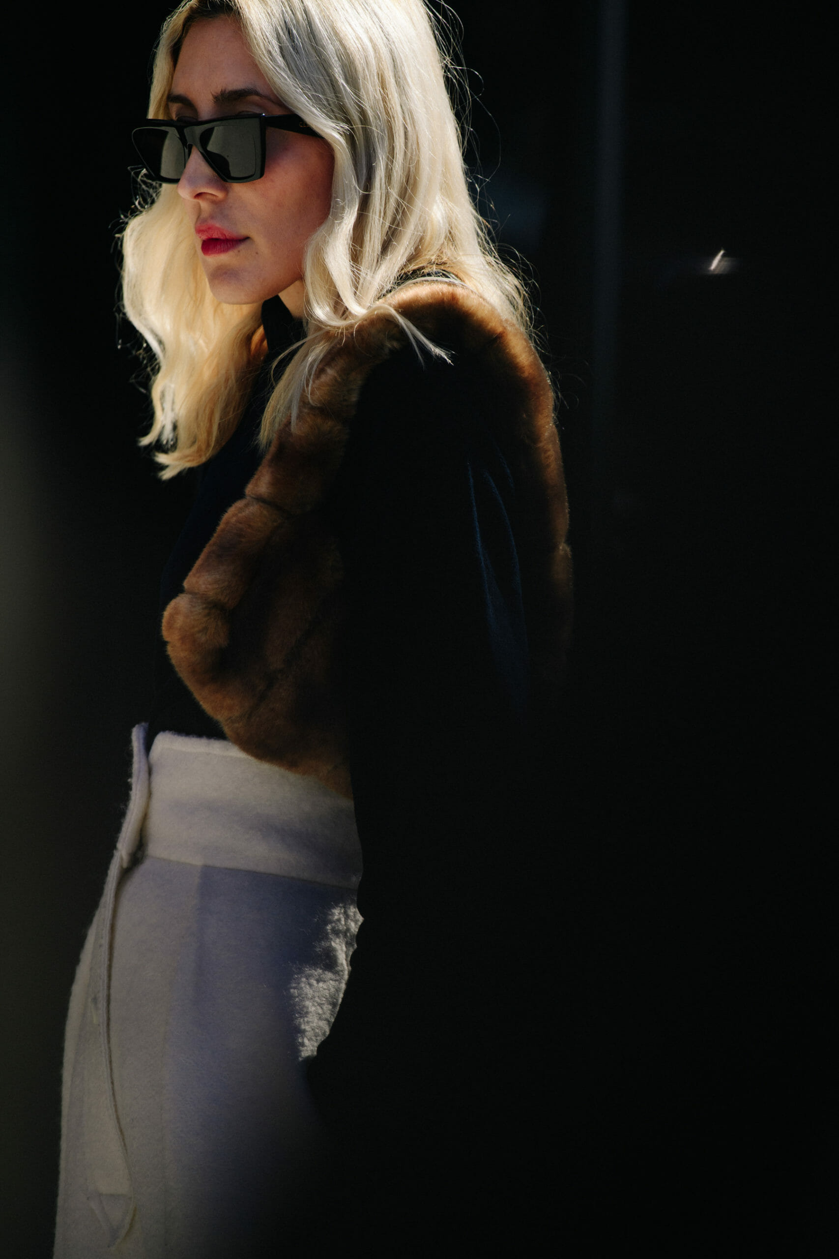 Woman wearing fur jacket