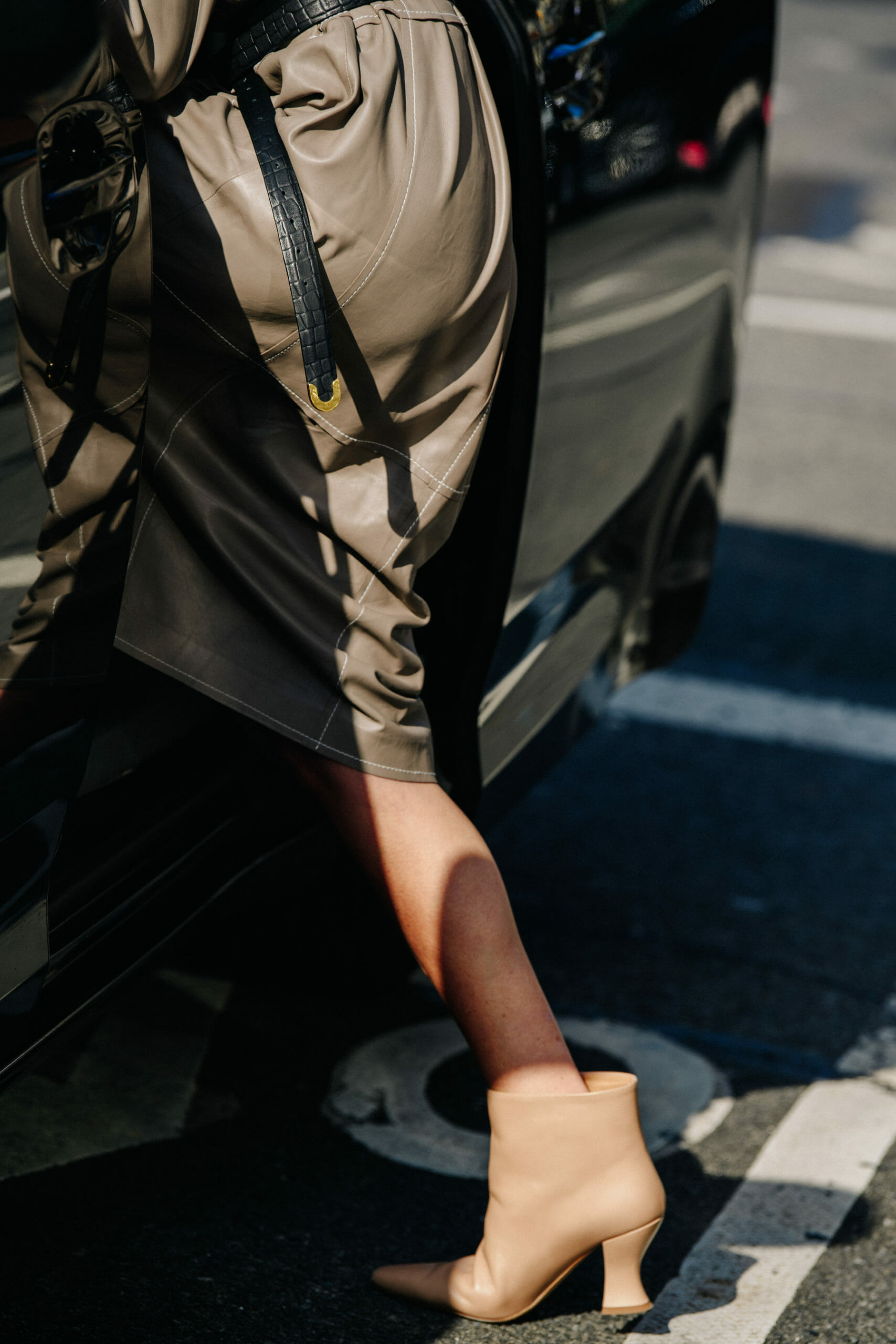 Woman wearing leather skirt