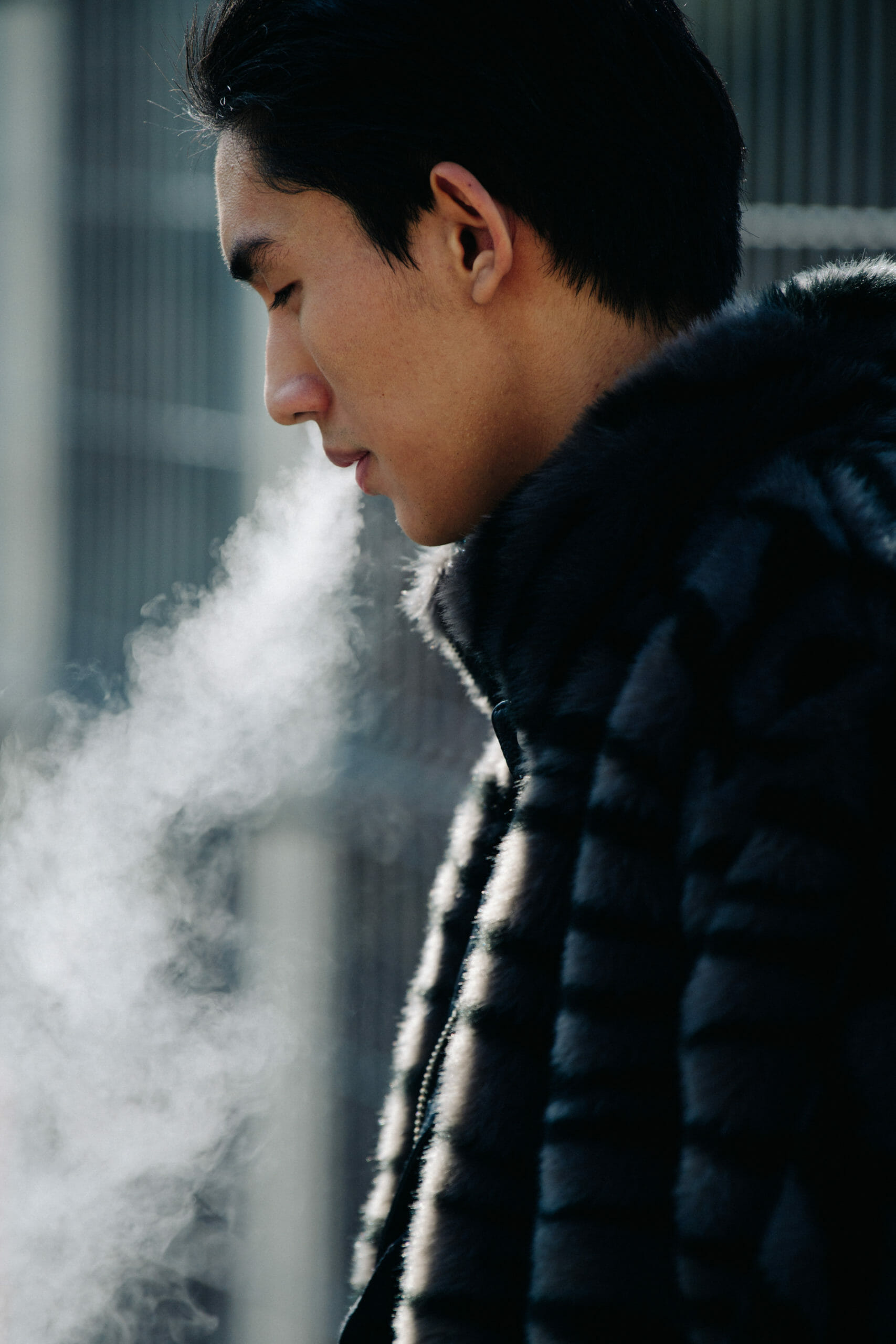 Man smoking in fur coat