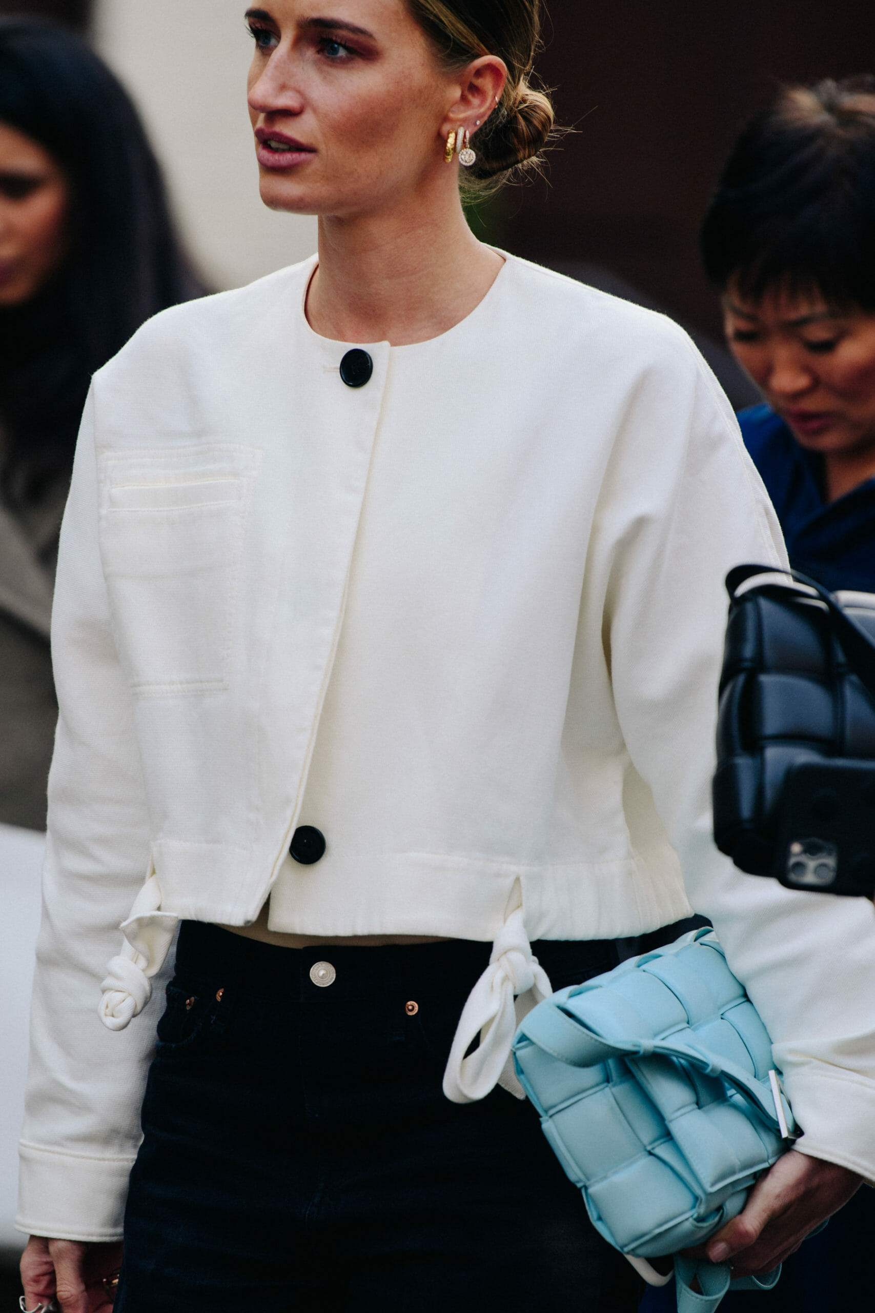 Woman wearing white jacket
