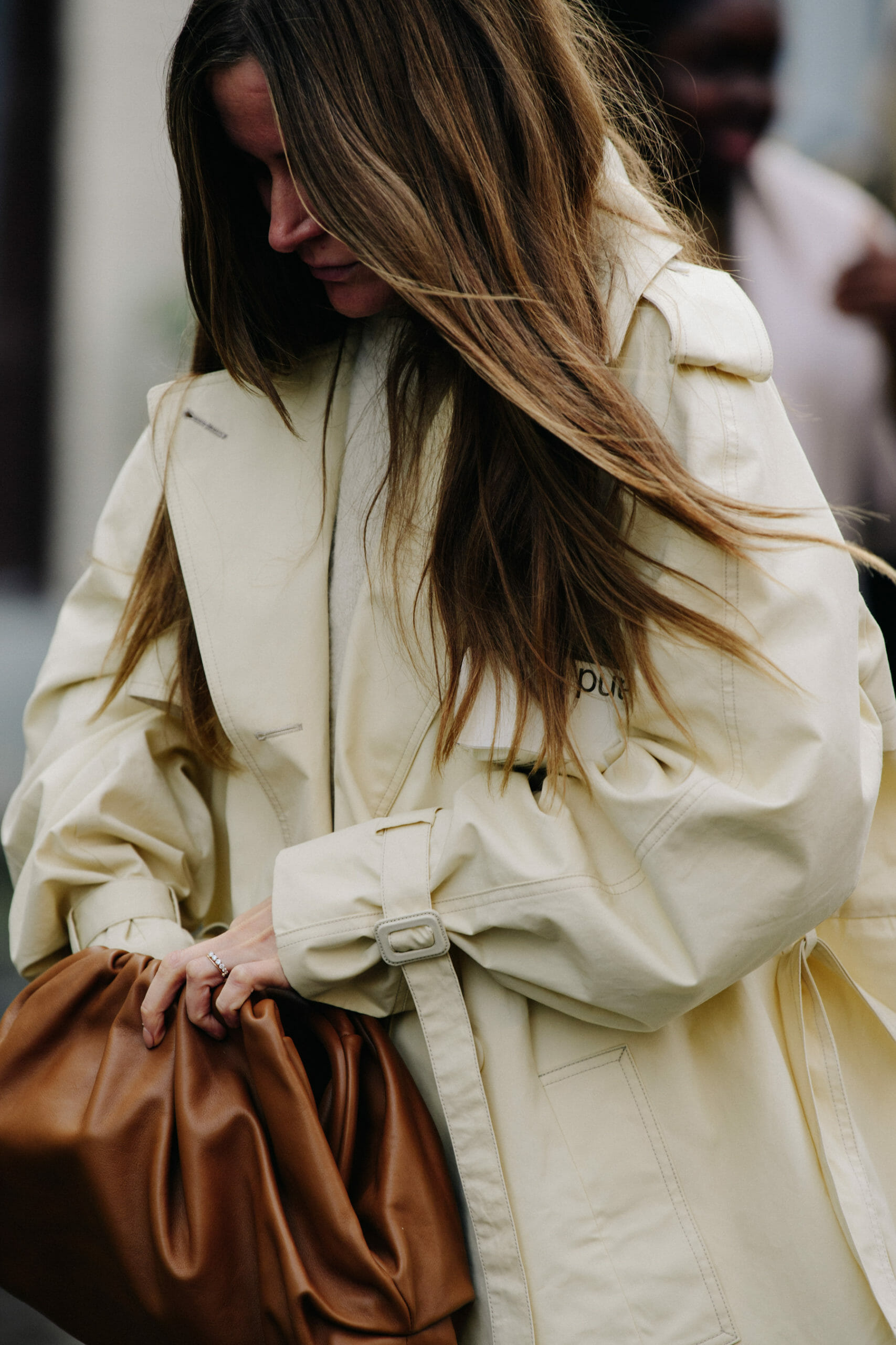 Woman wearing white coat