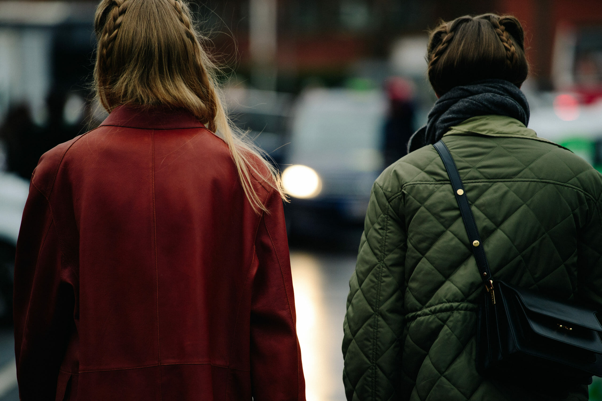 Two models wearing green and brown