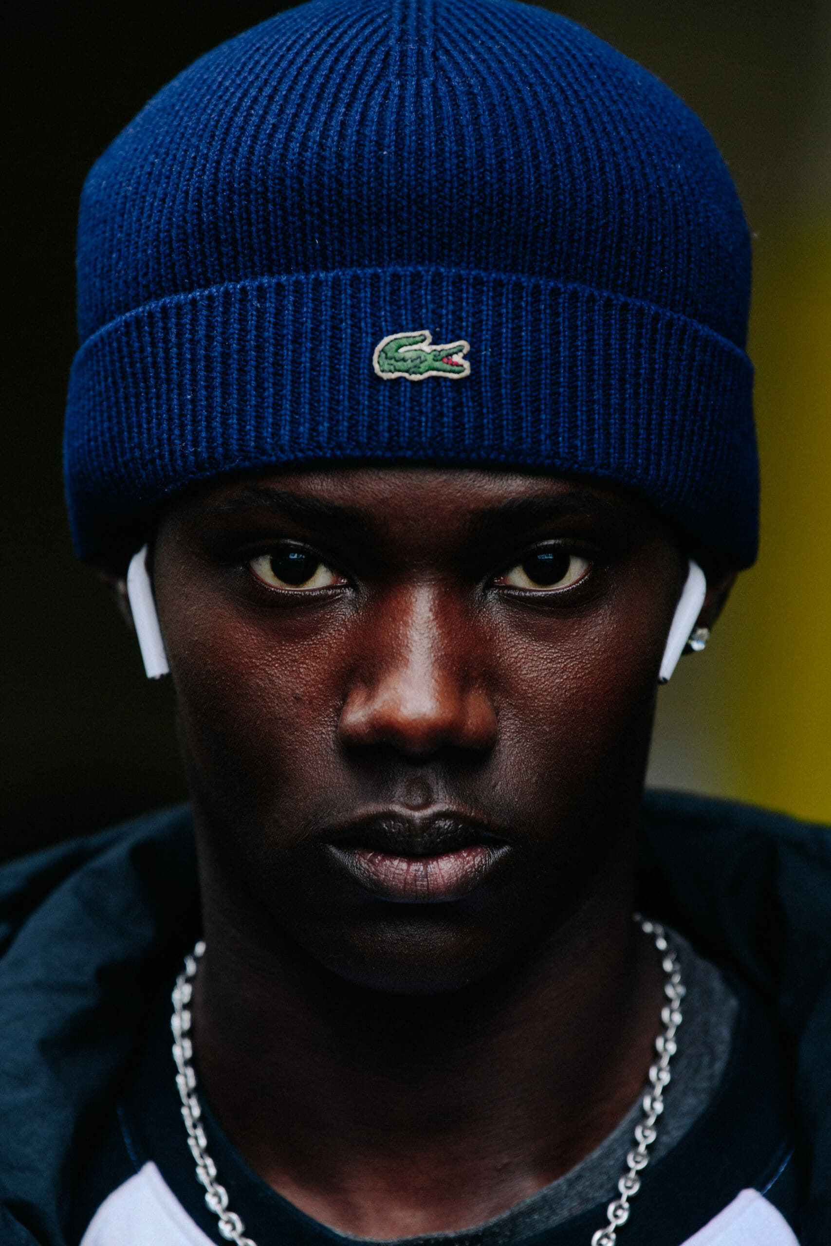 Model wearing Lacoste beanie