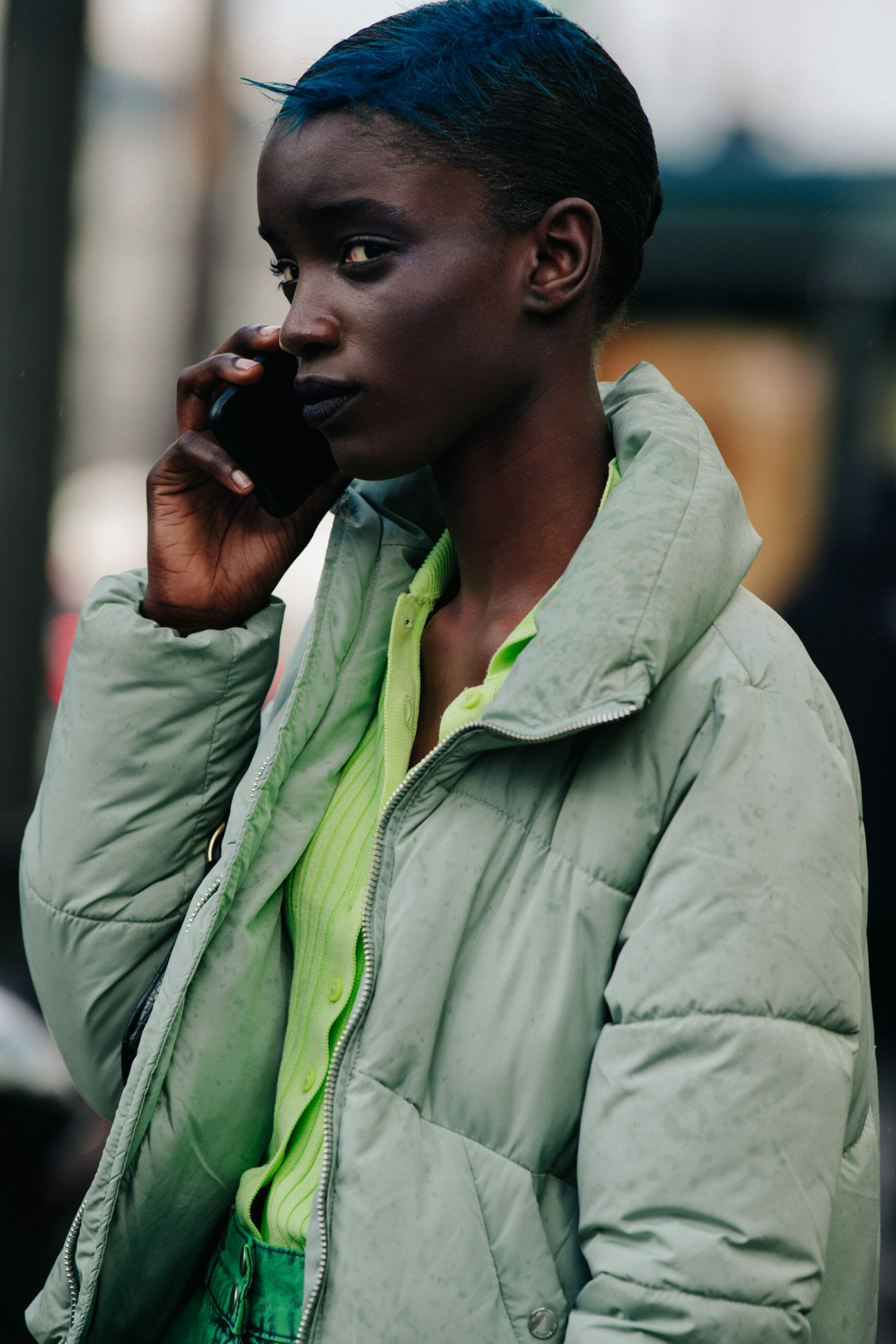 Model with feather in hair