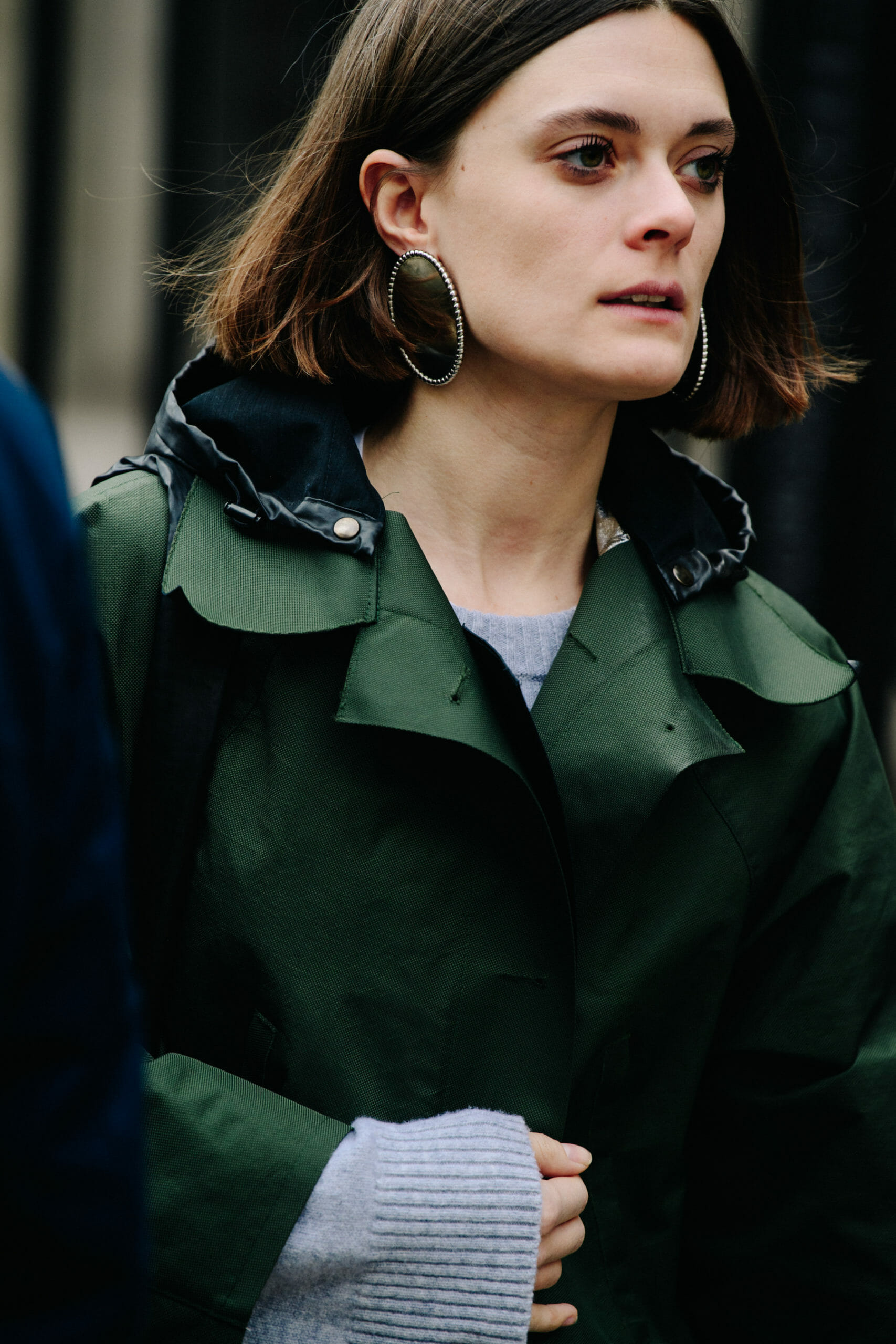 Woman wearing green coat