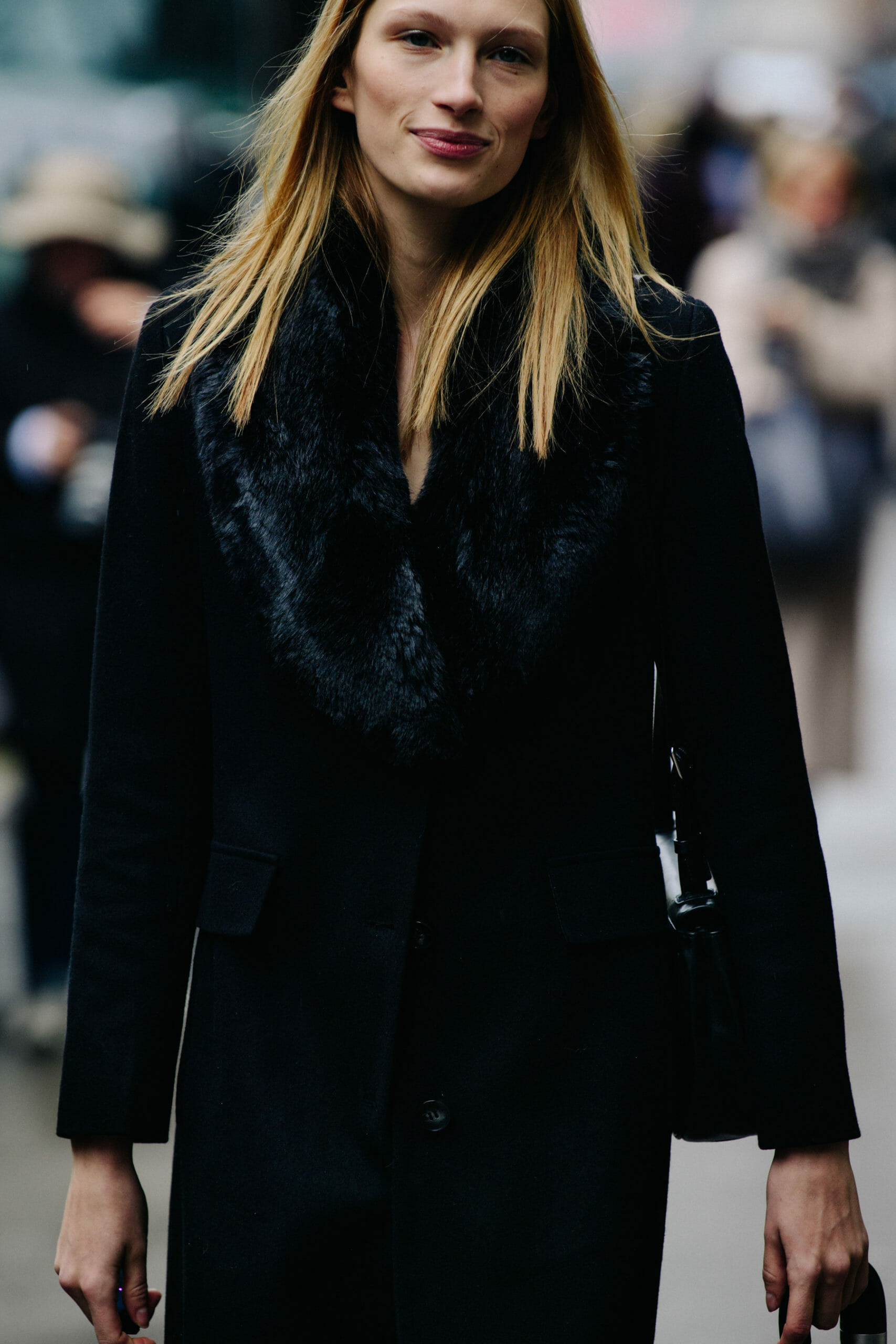 Model wearing black fur