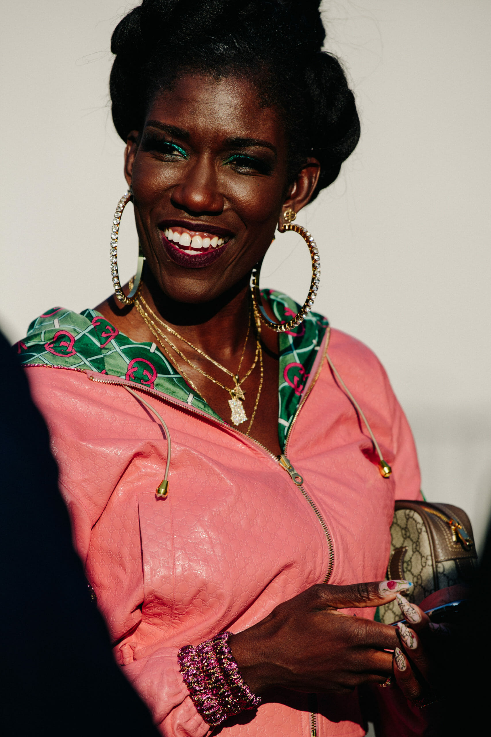 Woman wearing pink tracksuit