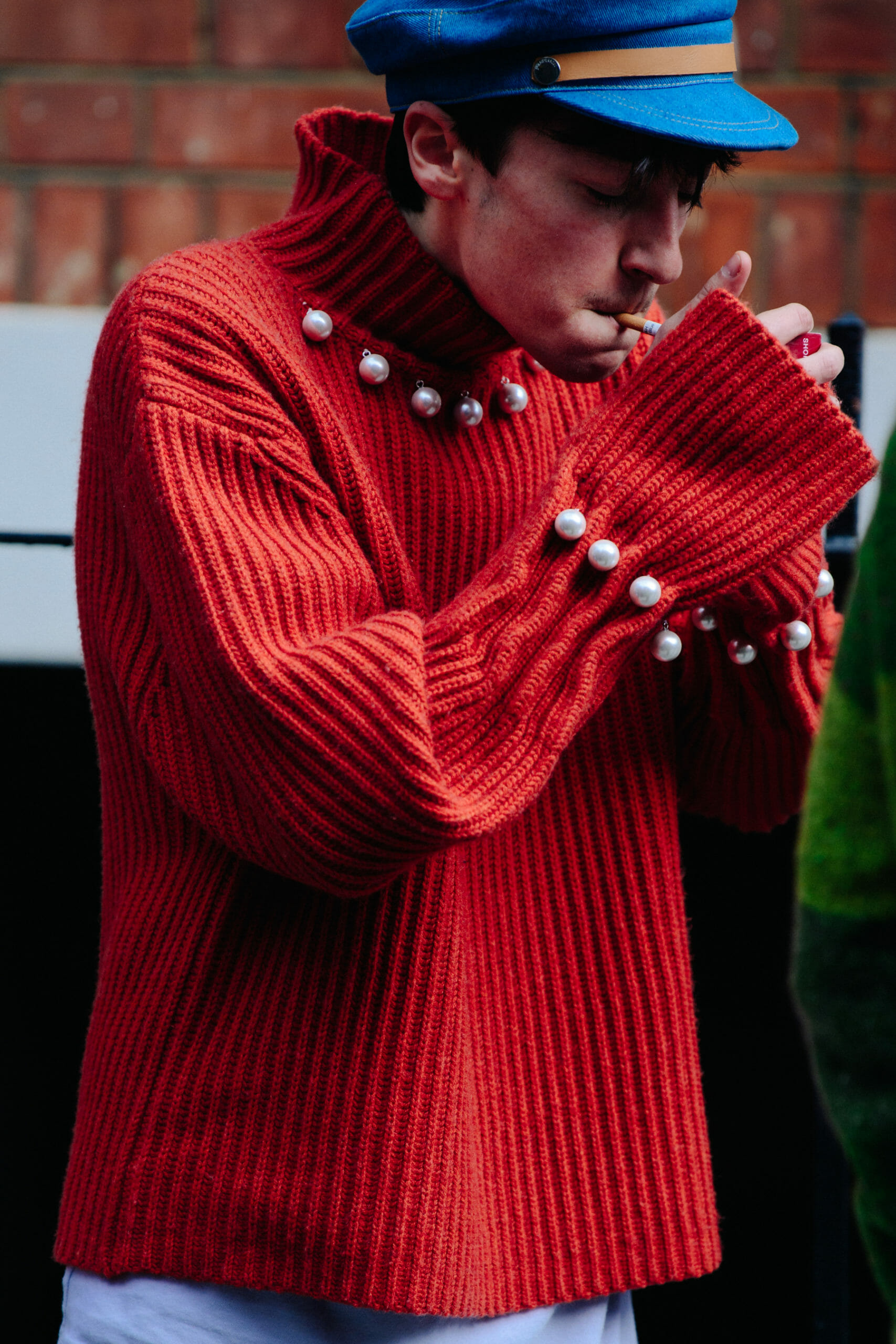 Man wearing red jumper
