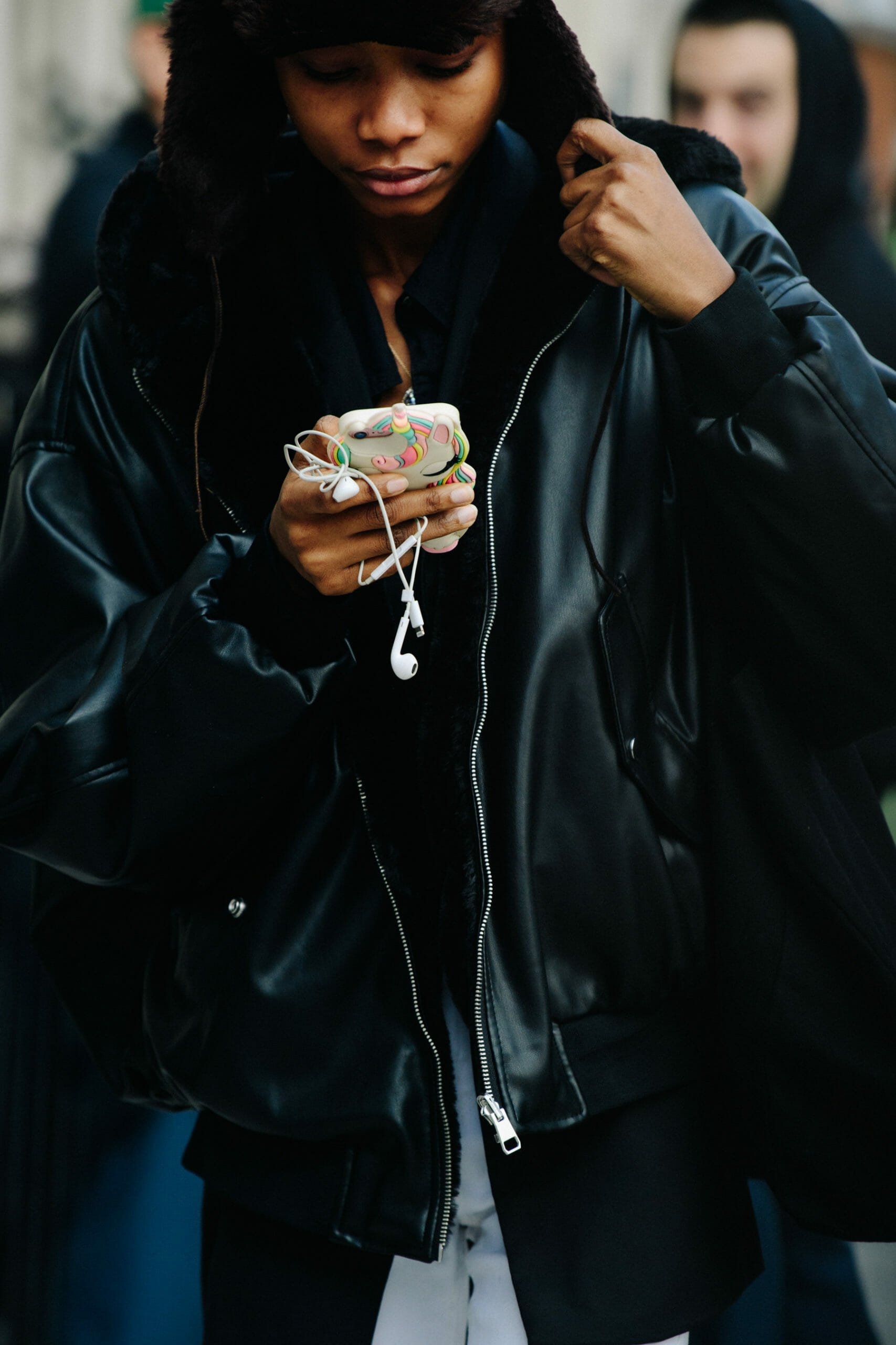 Model wearing black leather outfit