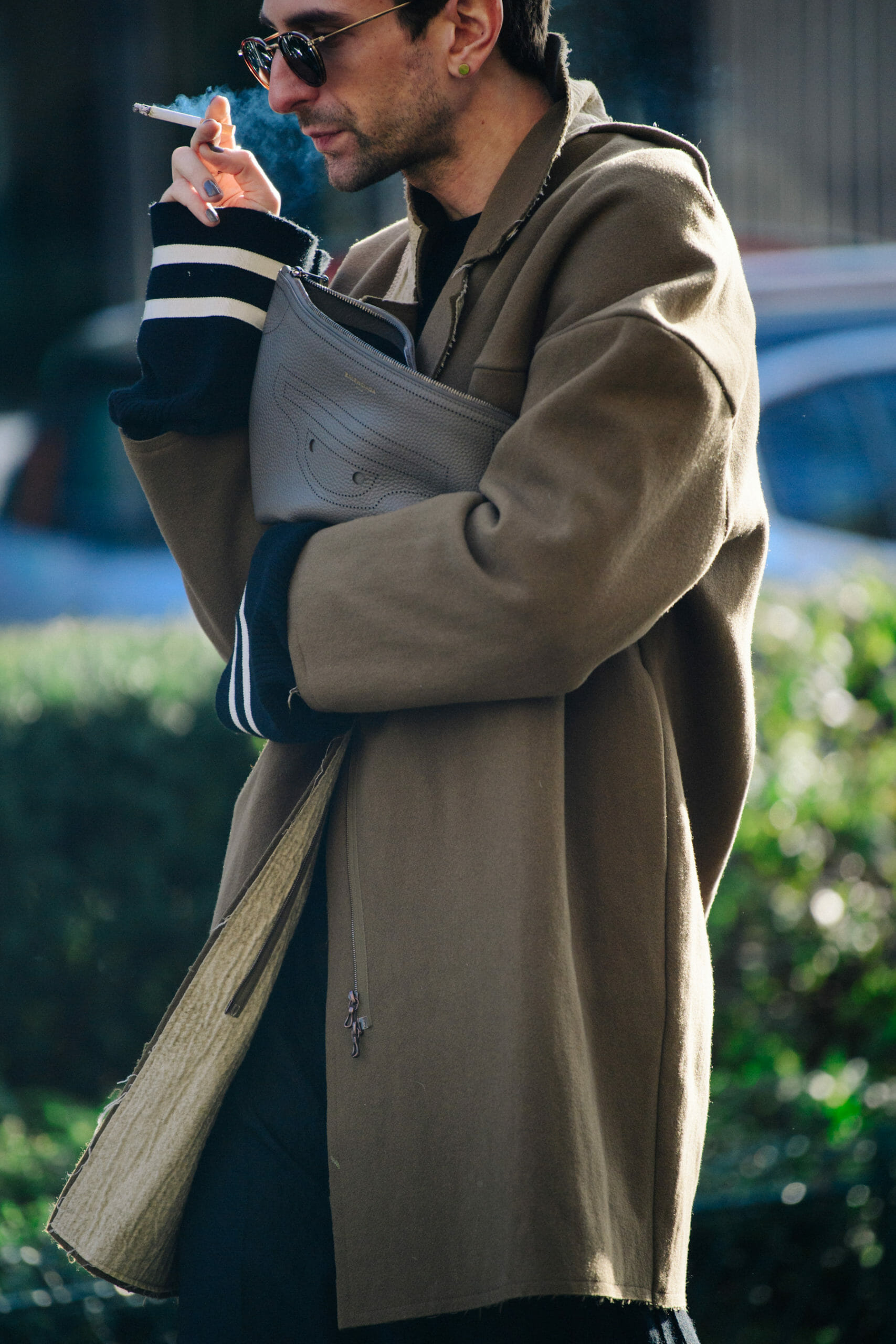 Man wearing tan coat