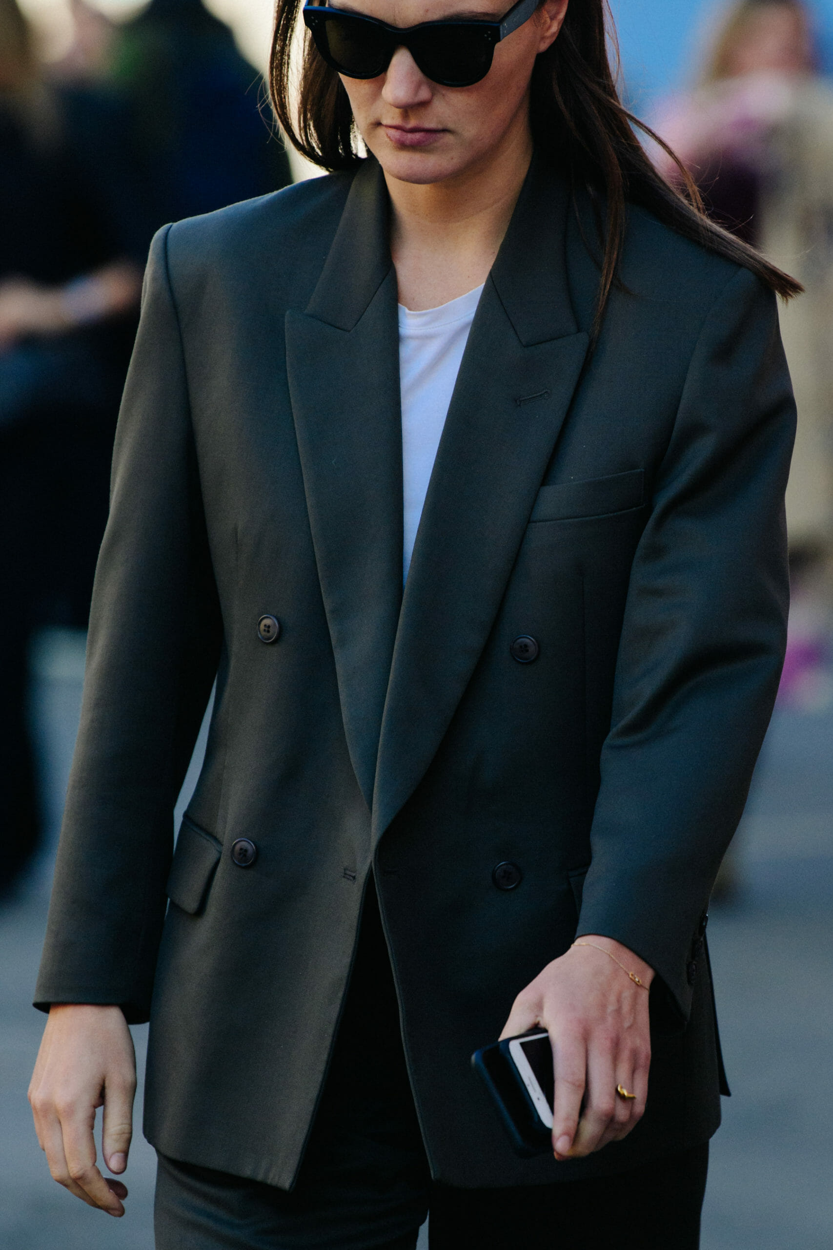 Woman wearing grey jacket
