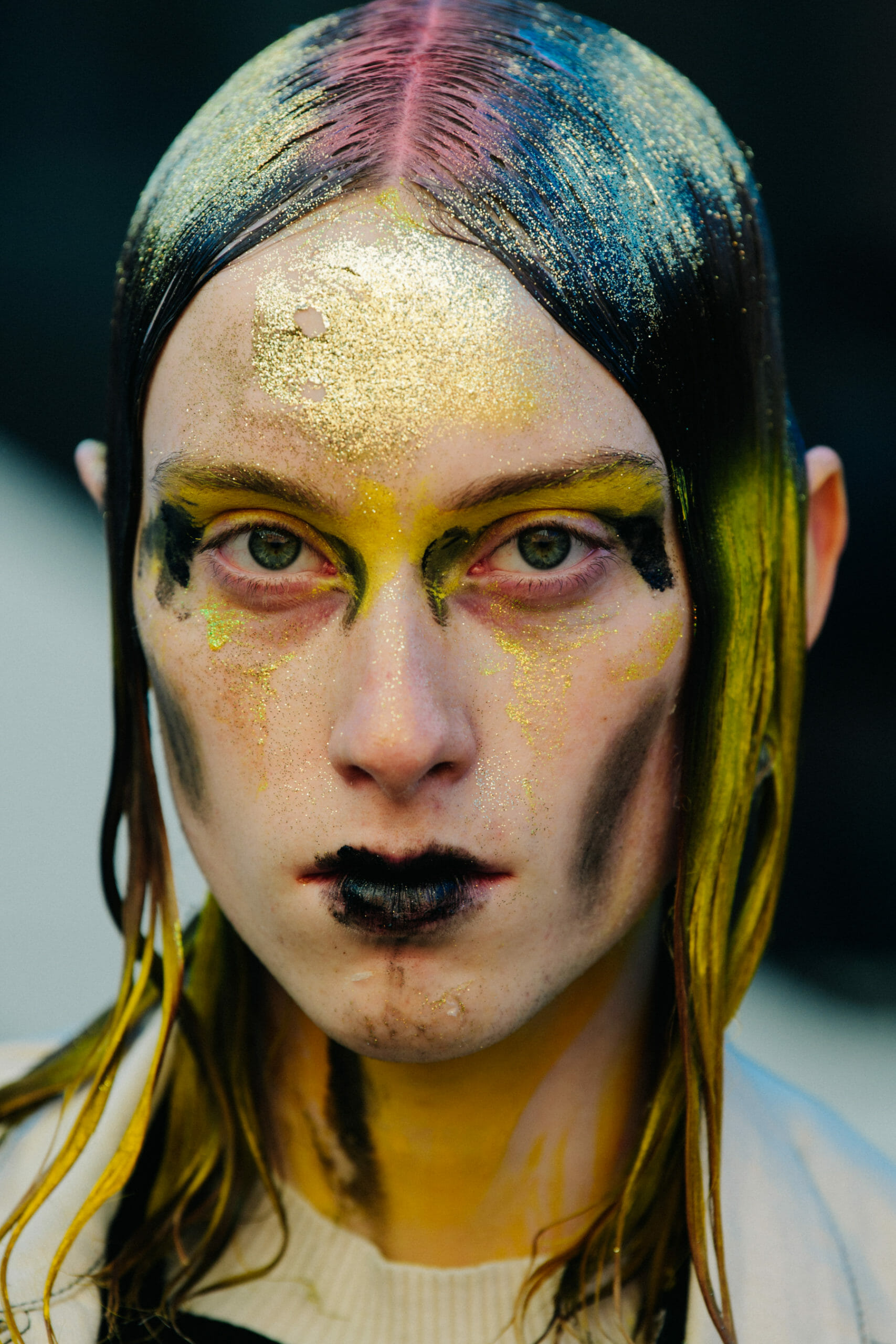 Male model with glitter in hair